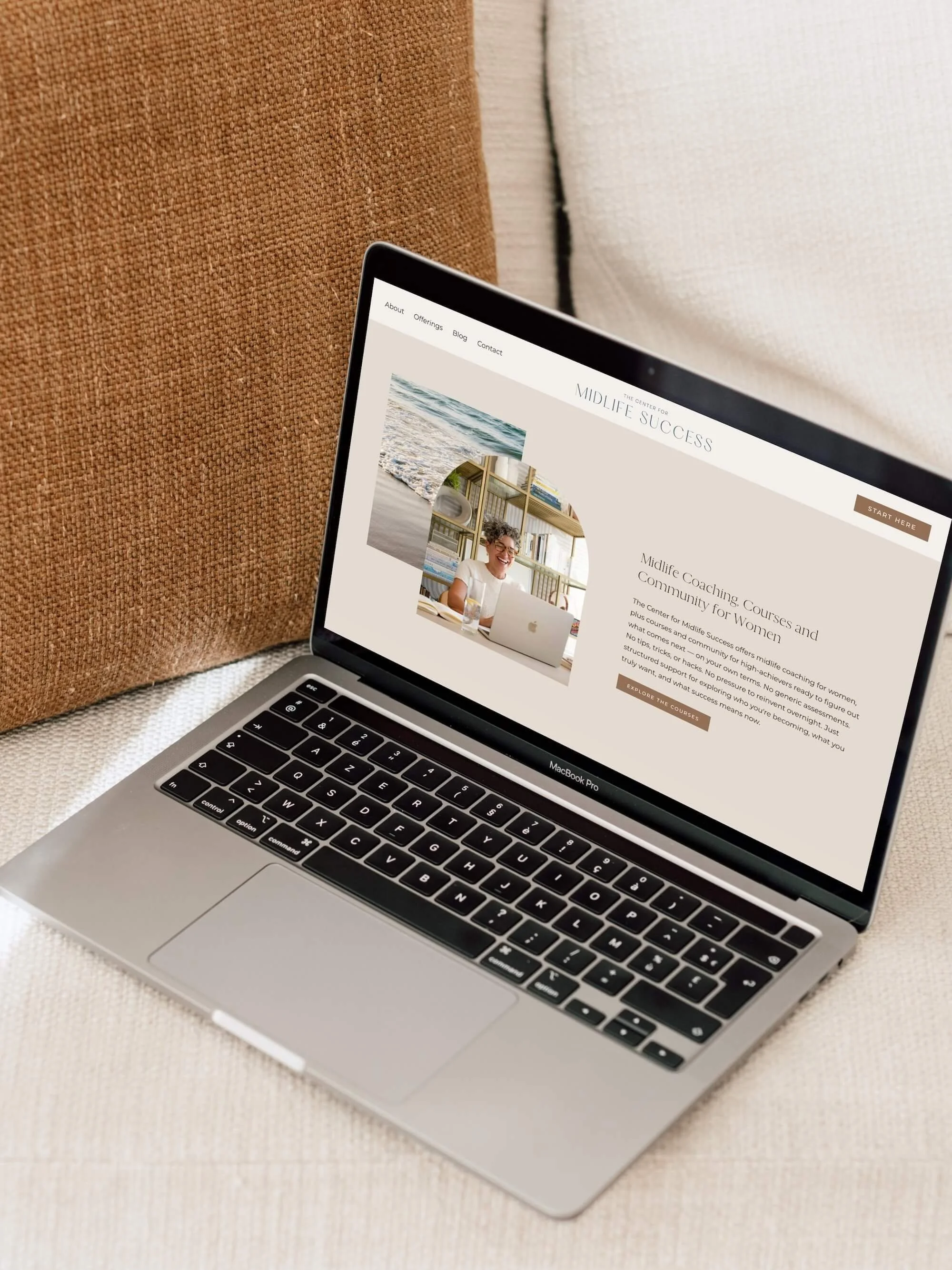 A laptop showing a Squarespace website design made for a women's midlife coach