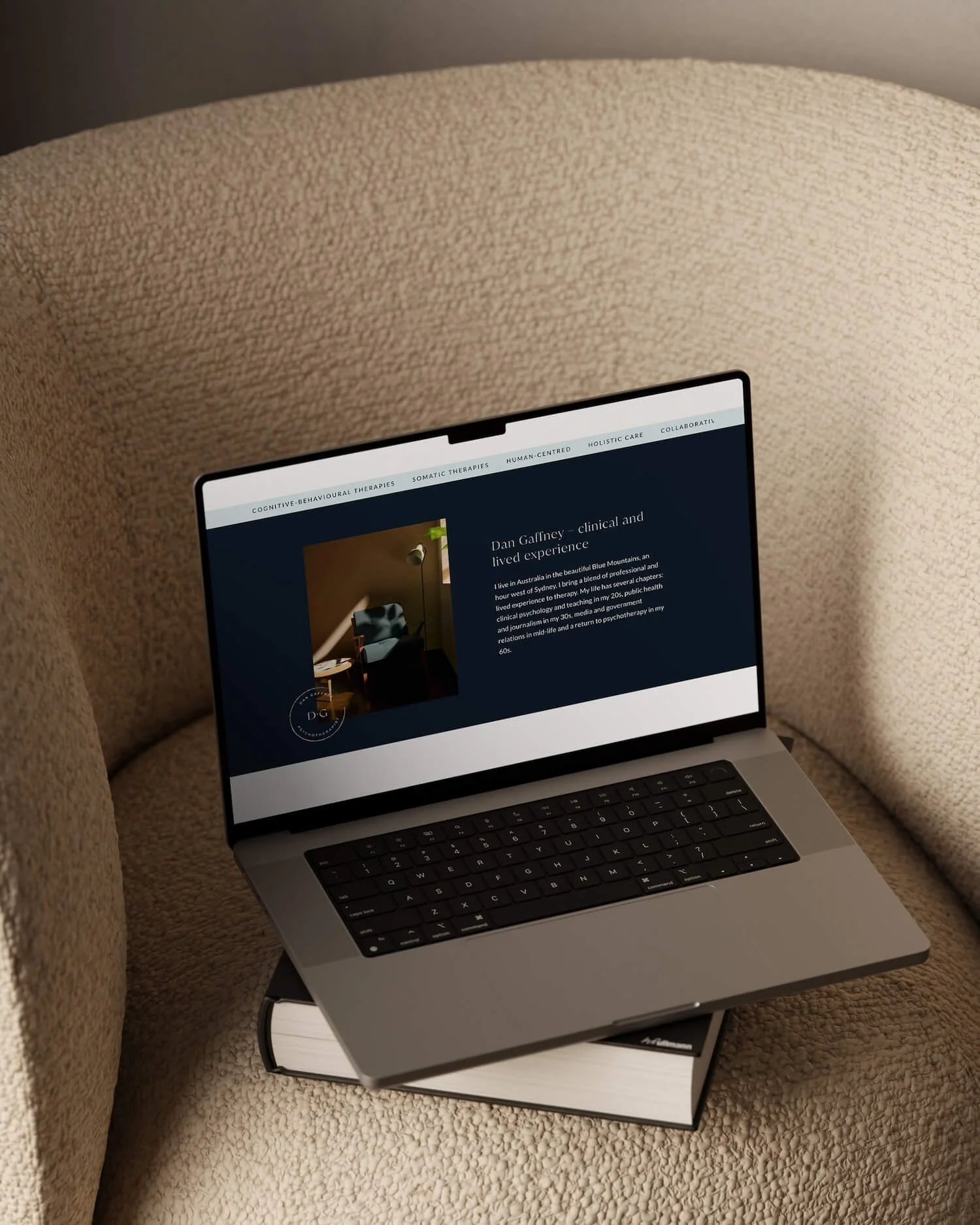Squarespace website design for a somatic therapist – laptop mockup showing the services page of Dan Gaffney Psychotherapist, with deep teal value cards and a colour overlay section in navy.