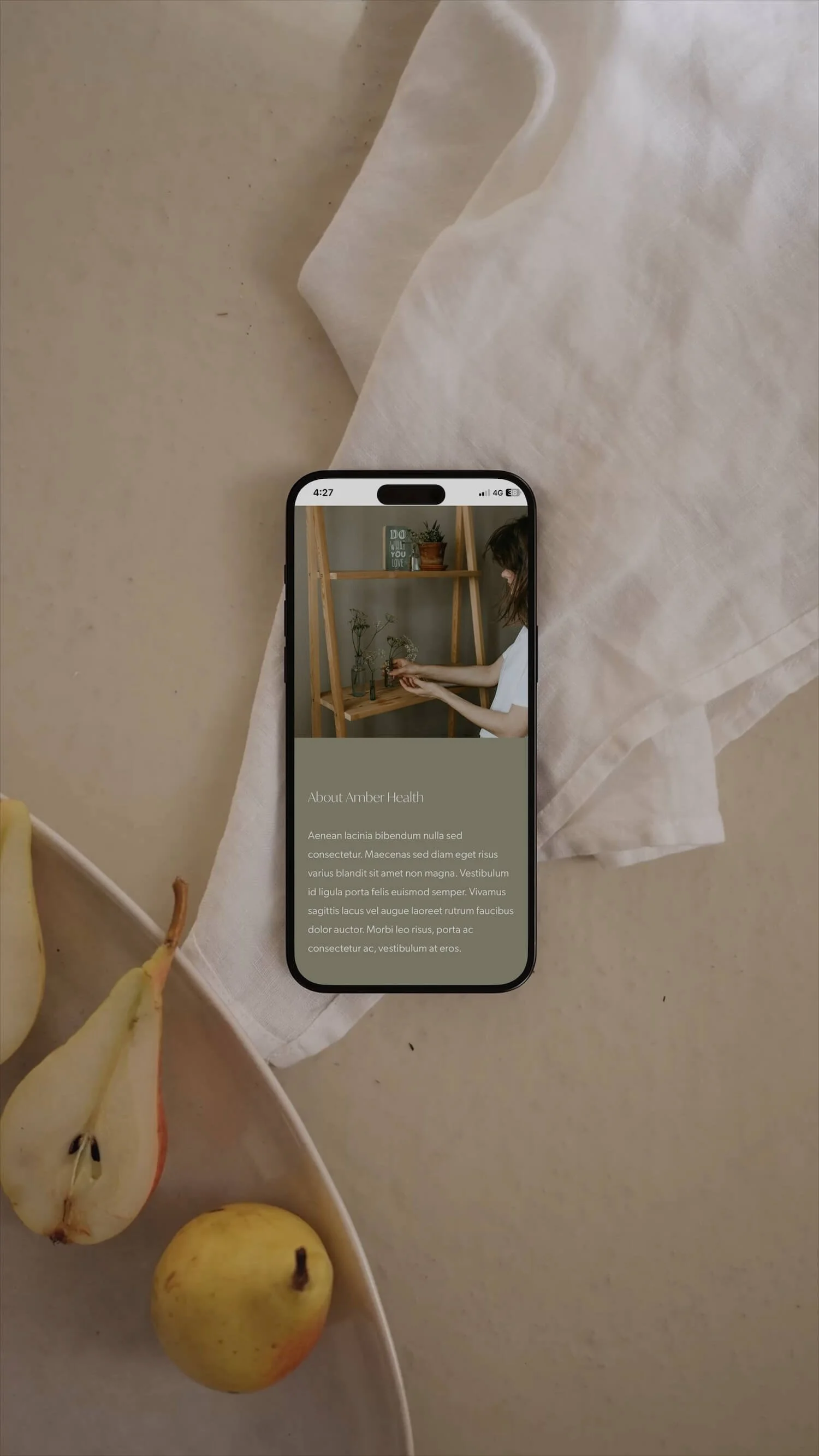 A mobile phone showcasing a call to action on a wellness website design