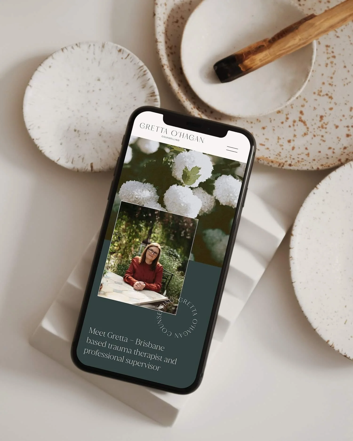 Mobile view of counselling website on smartphone, demonstrating responsive website design for somatic therapist and counsellor.