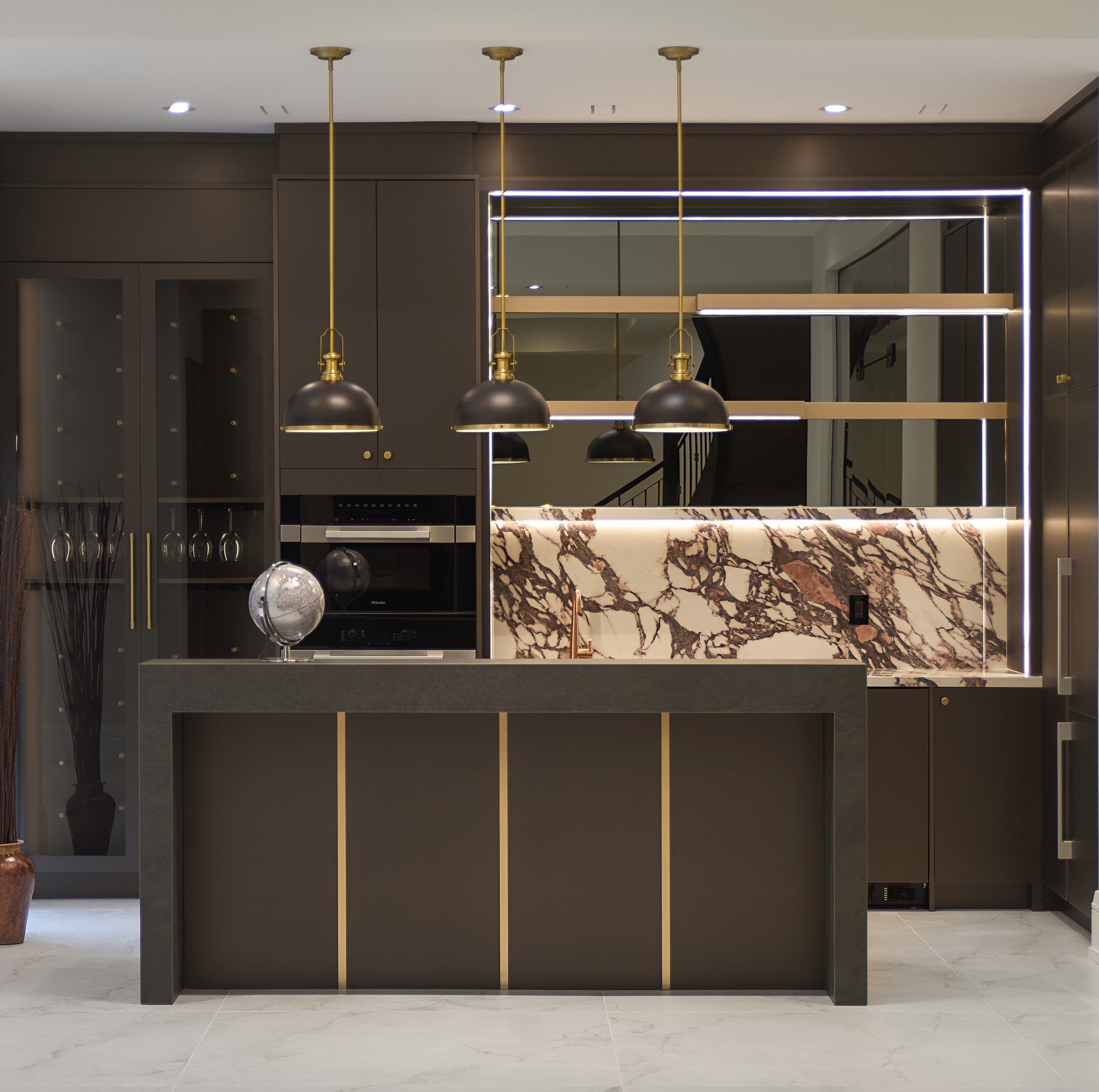 &bull;
This basement was designed to feel more like a private members lounge than a lower level.
Moody tones, dramatic stone, and layered lighting...
All coming together to create a space made for hosting, unwinding, and disappearing into the night. 