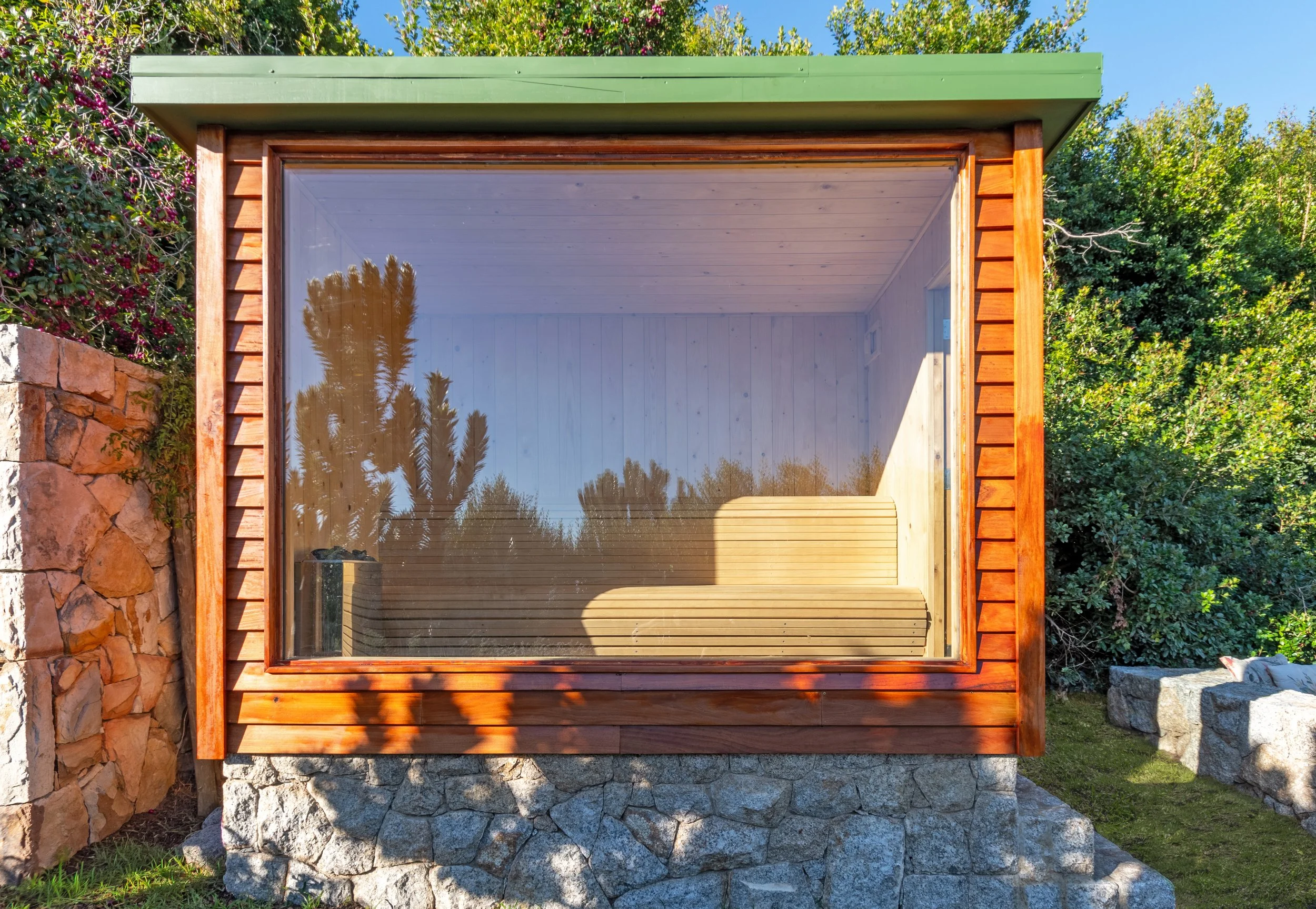 Our 8 seater sauna features a massive window with exceptional garden, mountain and even sea views.