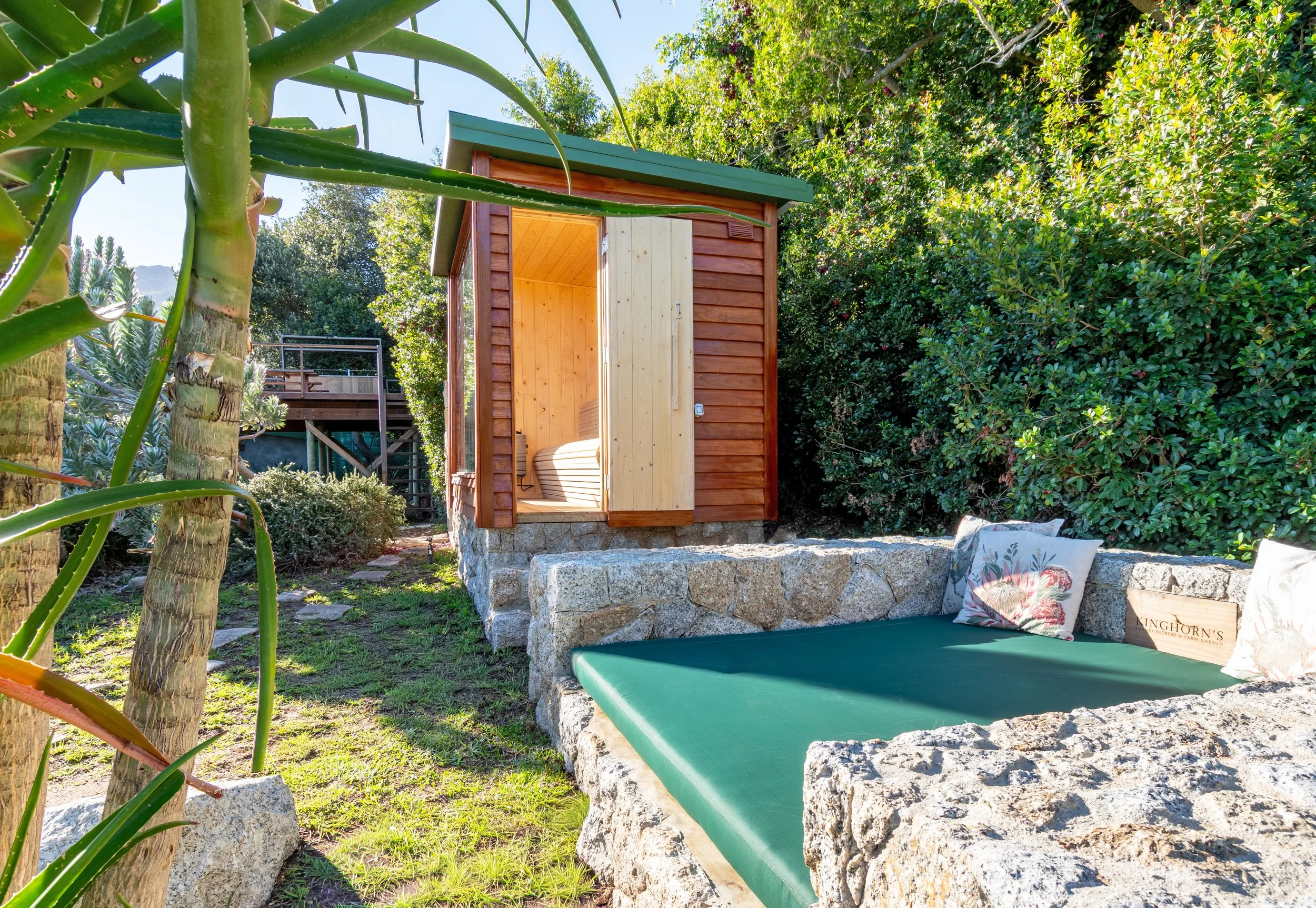The state of the art outdoor sauna and daybed both have spectacular, uninterrupted garden, mountain and even sea views.