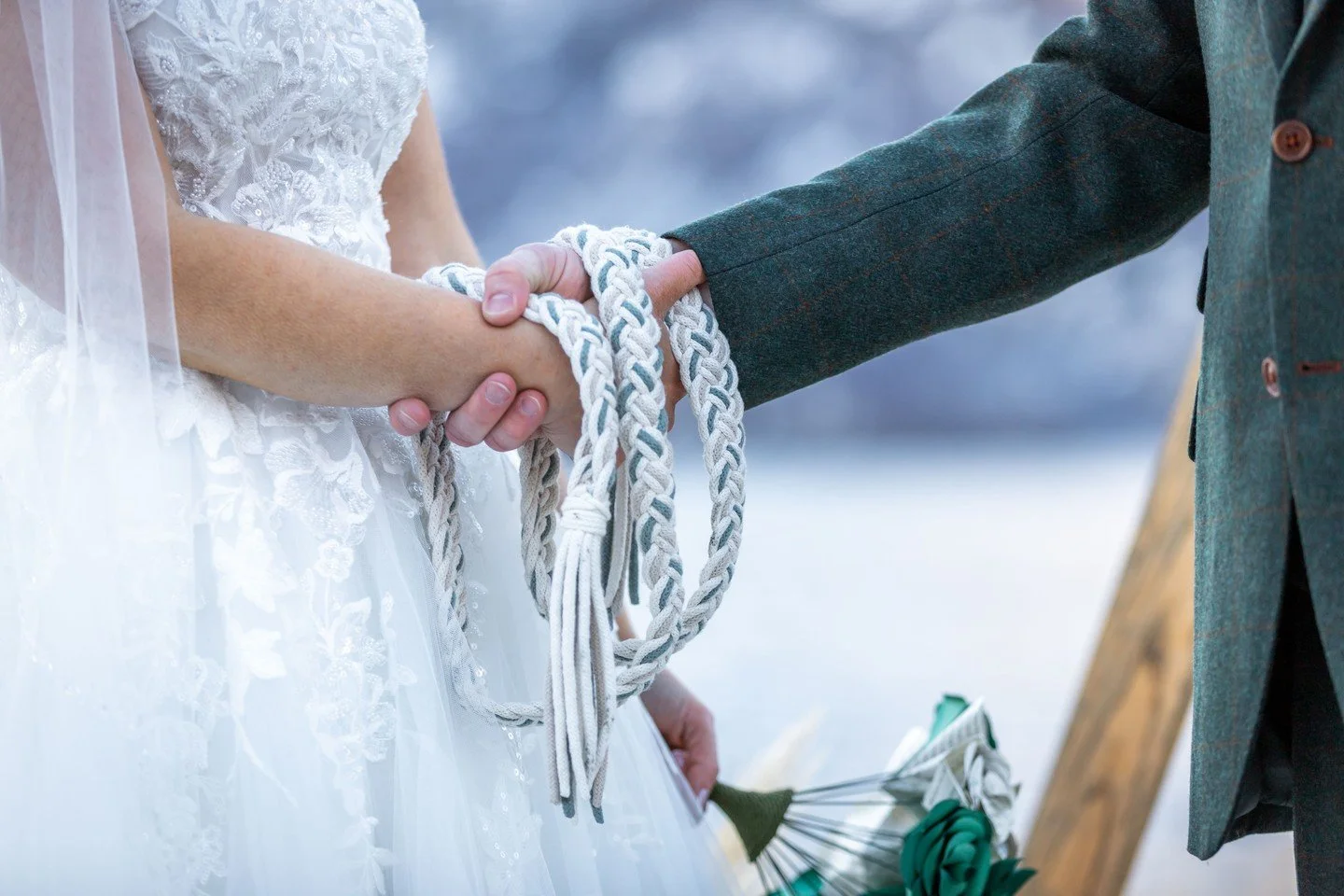 A rope, two hands, and a promise that holds.

Handfasting is one of the most intimate ways to begin a marriage &mdash; an ancient Celtic and Norse tradition where the couple's hands are literally bound together as they make their vows. It is a physic