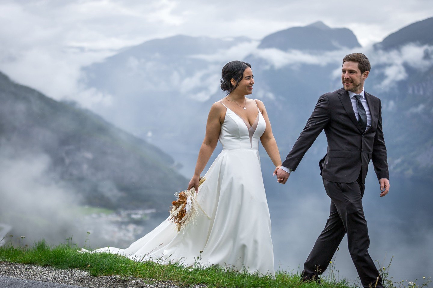 Misty mountains, winding paths, and a moment that feels like forever. 🌿

This is Aurland in summer &mdash; and there is nowhere quite like it for a wedding day. The cool air, the fjord below, the mountains rising all around. Dramatic and intimate al