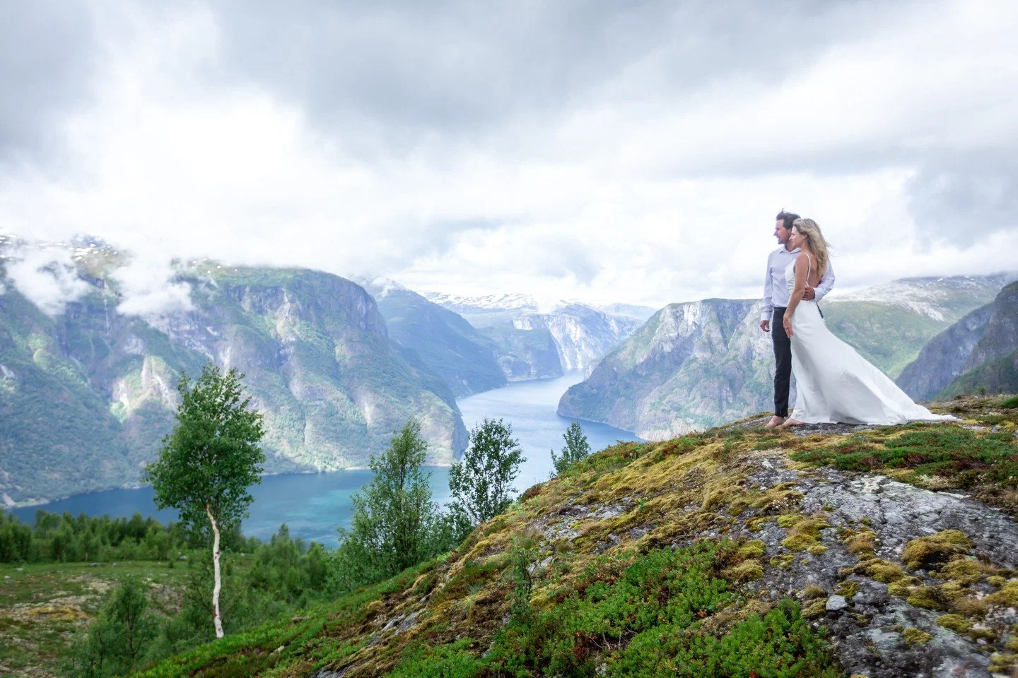The fjord has no beginning and no end. Just endless, breathtaking now.

This is Sognefjord on a summer morning, when the mist still clings to the mountains and the water below holds its mirror-still silence. The kind of landscape that makes you forge