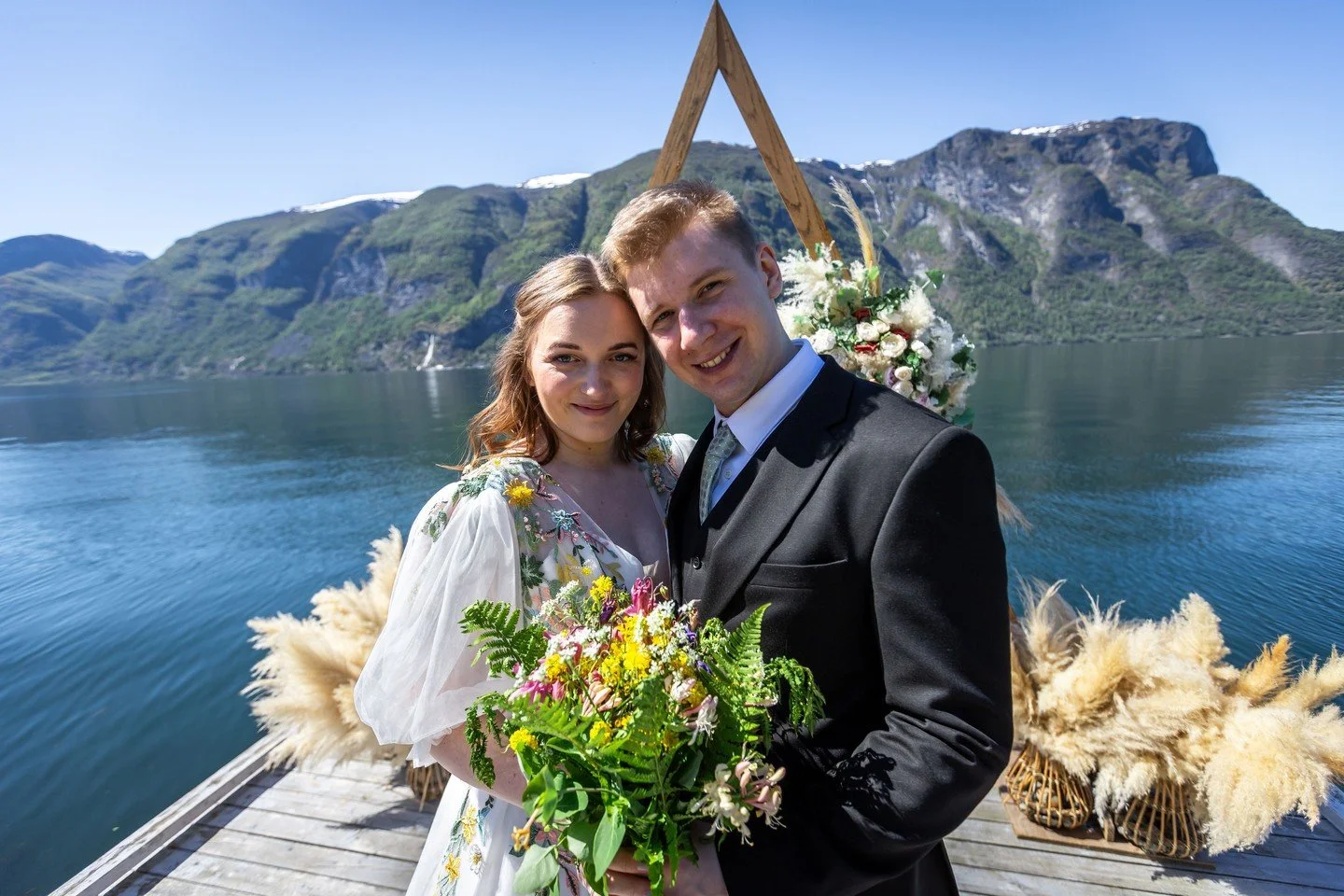 Meet on the dock. Say your vows with the fjord stretching out behind you. Celebrate with the people you love most.

This is what a Fjord Wedding day looks like when it is built entirely around you.

Every detail in this image was planned, styled, and