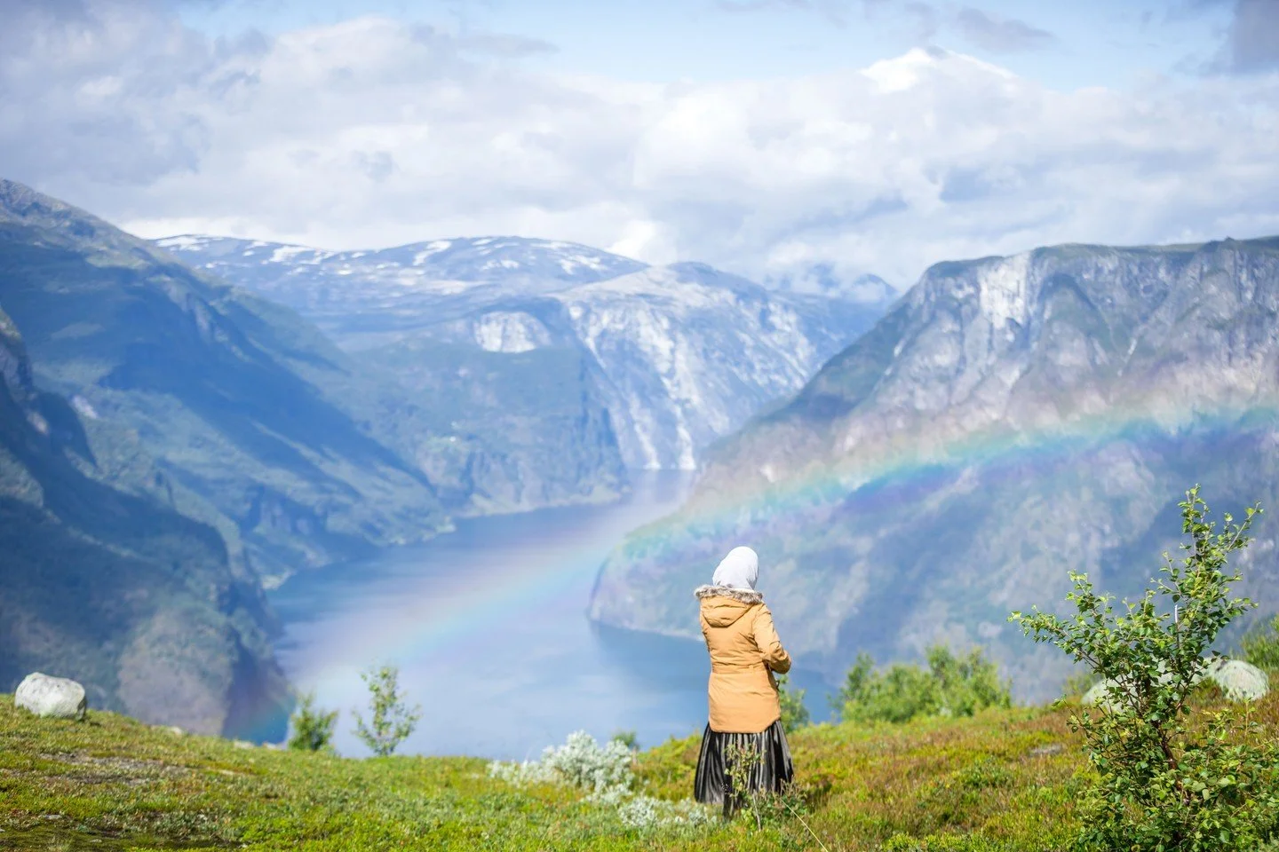 We work up above, where the rainbows live.

This is what our office looks like on a good day.

High above the fjord, where the mountain weather moves fast and the light does things you cannot predict or plan for. One moment overcast. The next, a rain
