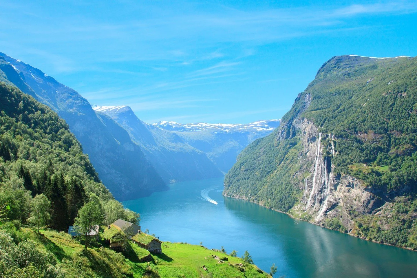 Geirangerfjord. UNESCO World Heritage Site. One of the most photographed places on the planet &mdash; and still, nothing prepares you for seeing it in person.

The waterfalls cascade hundreds of metres down the cliffs. The water below is a blue so de