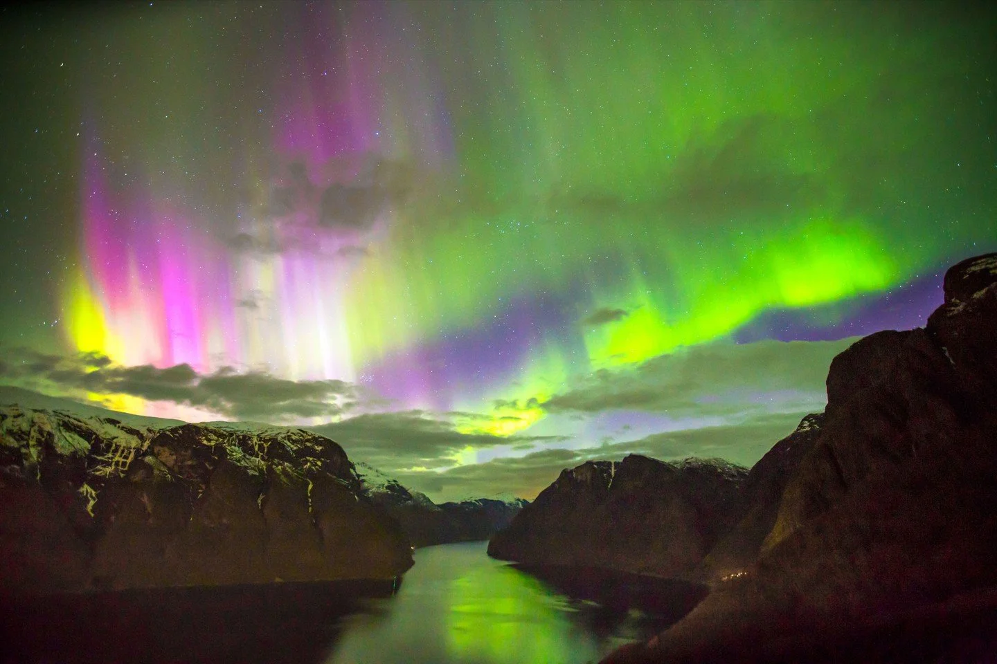 The Aurlandsfjord on a clear winter night. Shot by Paul Edmundson.

The northern lights do not appear on schedule. You cannot book them or plan for them. They come when they come &mdash; green and violet and impossibly alive, reflecting in the black 