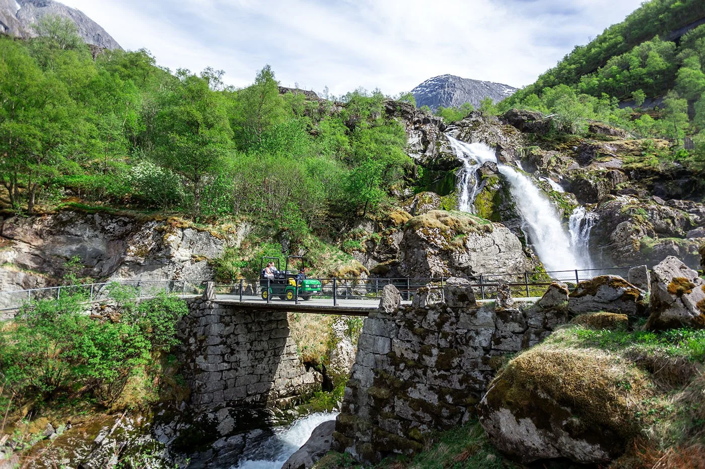 Couple Getting Married At A Waterfall In Norway