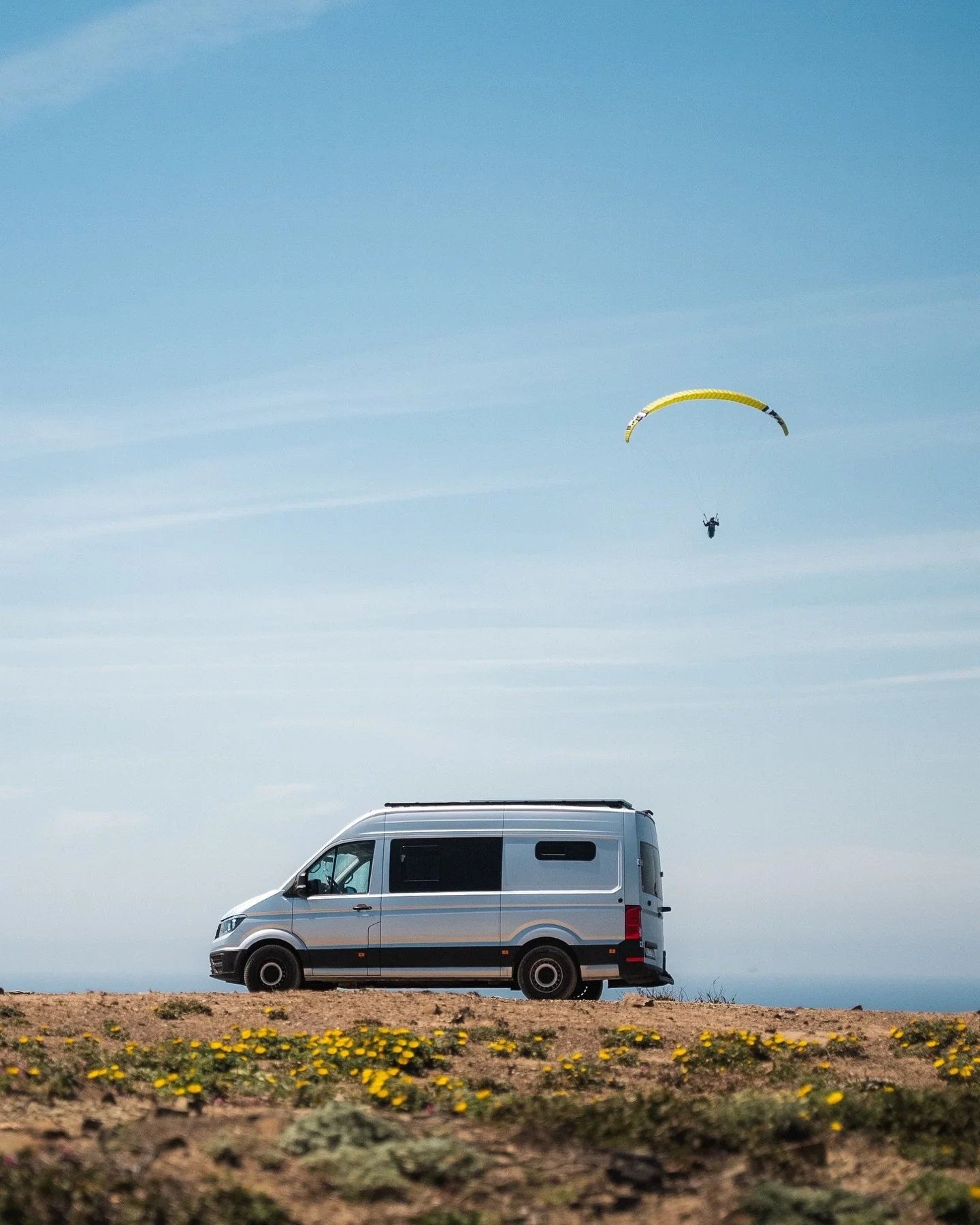 A few unpublished moments from our spring road trip through Portugal. I love that the Algarve is just a short drive from Tarifa, perfect for a quick escape to catch swells and enjoy some ridge soaring right next to the van. 🚐 

#portugal #paraglidin
