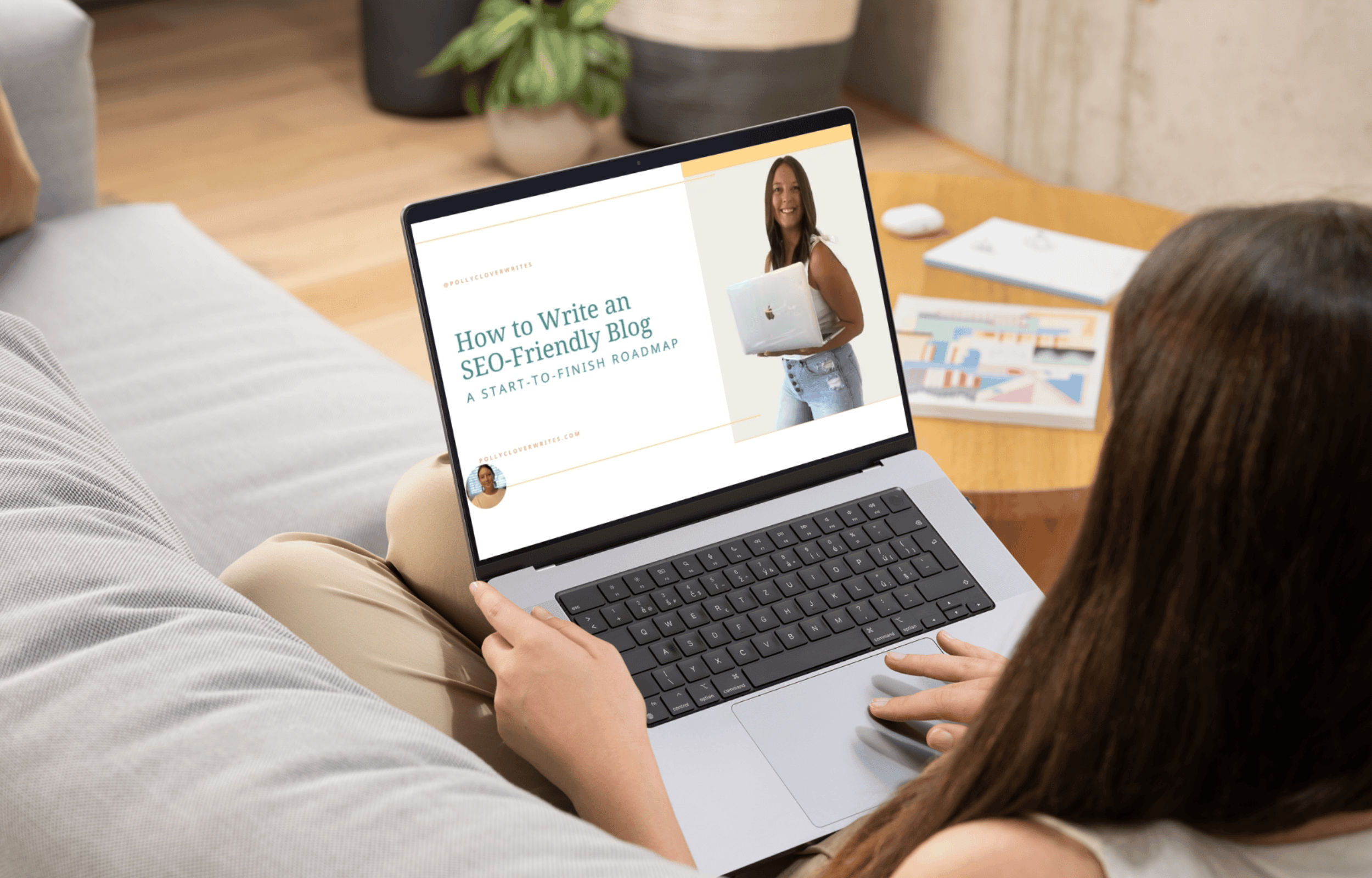 Woman sitting with laptop which chows the "How to Write an SEO-Friendly Blog: A Start-To-Finish Roadmap" course by Polly Clover.