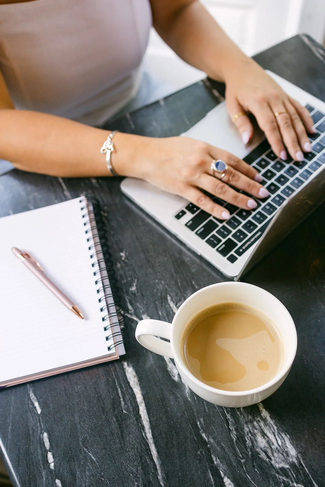 notebook, coffee, and laptop