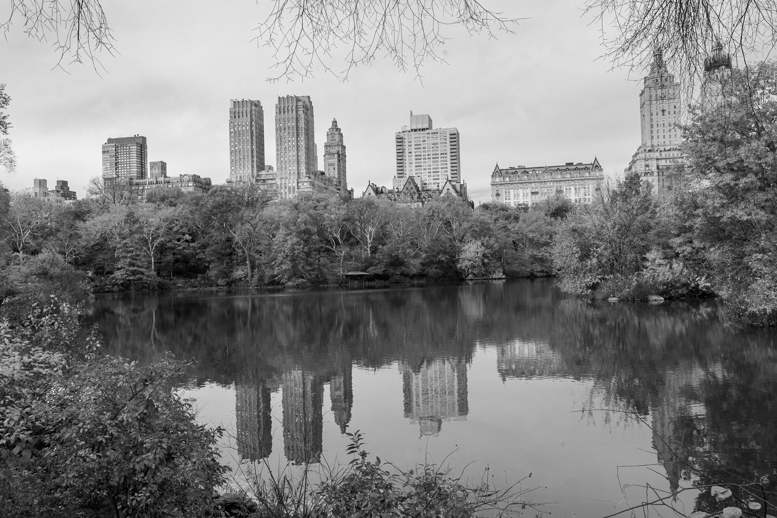 Upper West Side skyline from Central Park lake, New York City. Black and White fine arts