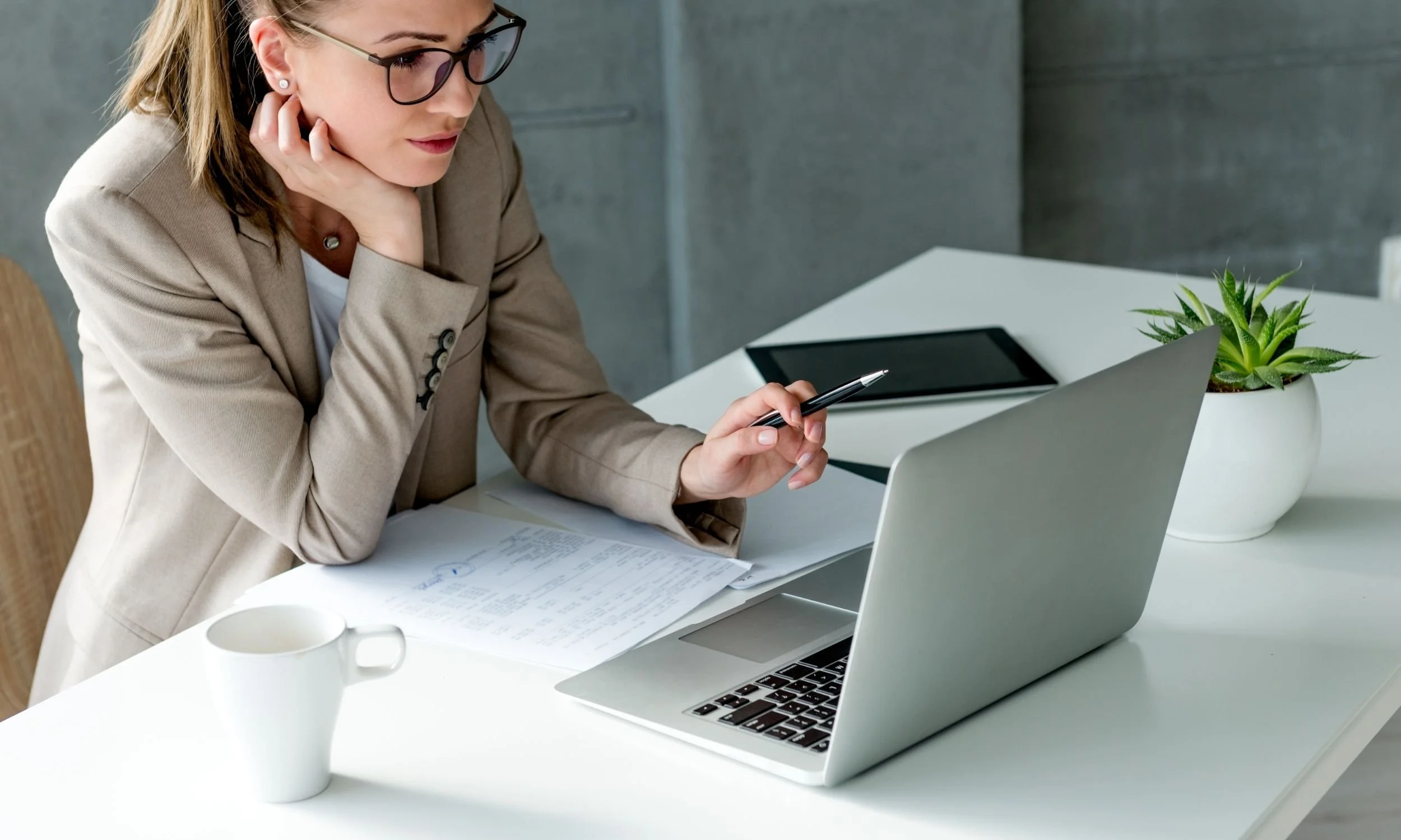 Executive Assistant CRM Management on Laptop