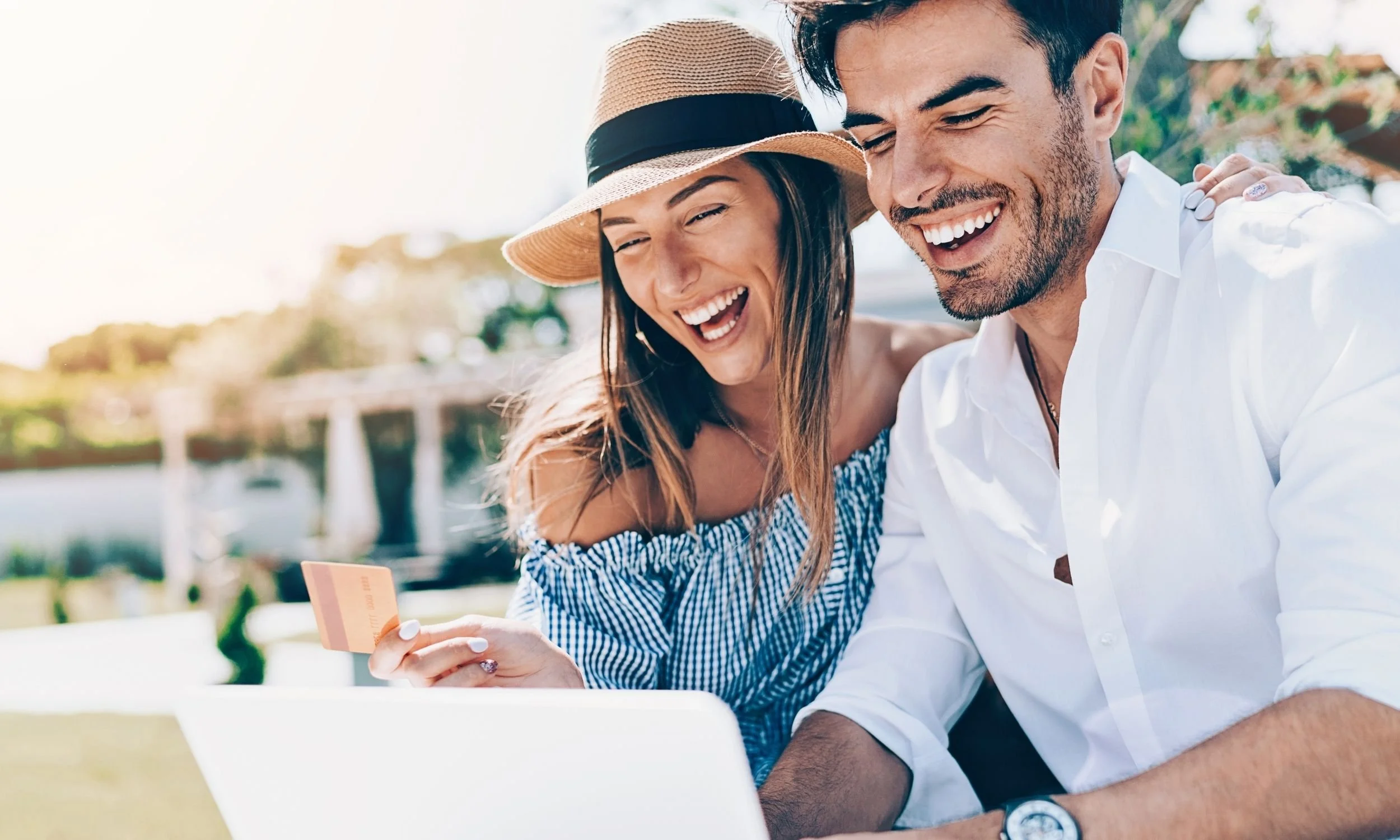 Wealthy Couple on Laptop