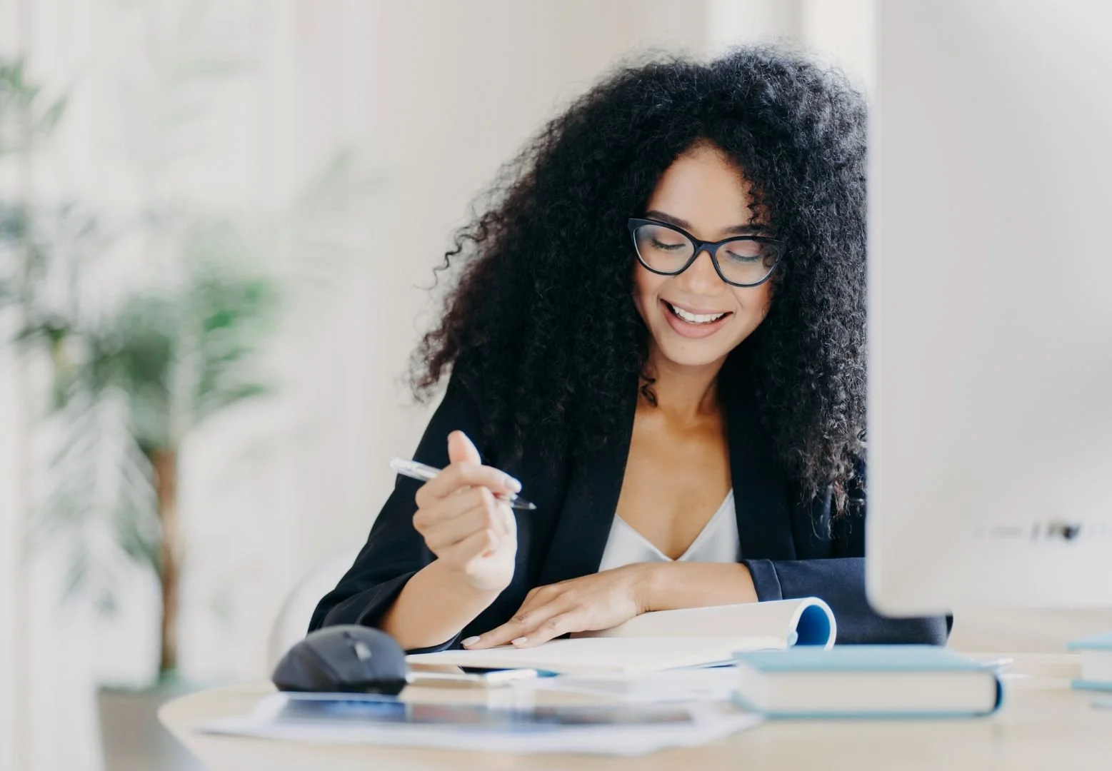 Executive Assistant at desk working