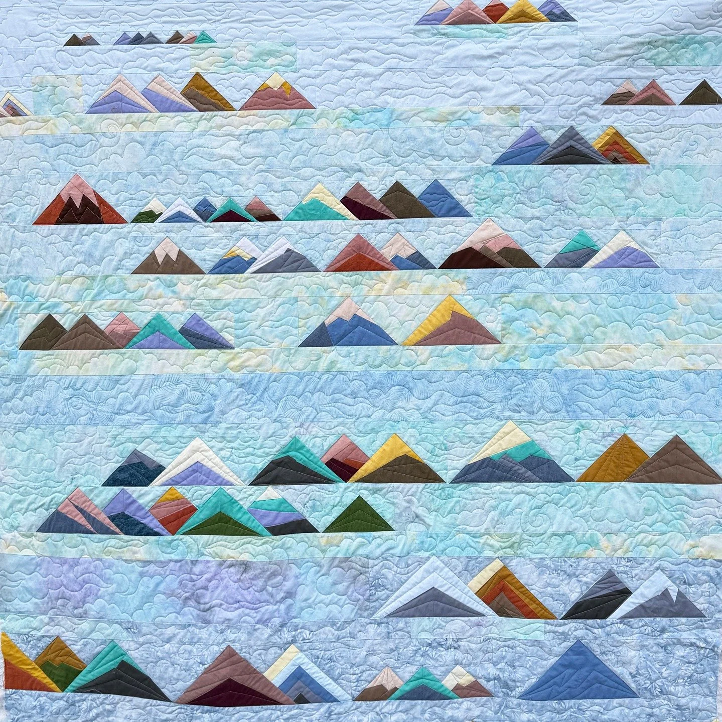 This post is a big, happy welcome back to my Tin Lizzie long arm machine! She was not working for far too long, but I finally got some help and some parts from the hardware store (Thanks, Dave @mcgin029!) and she's back! First project was this Mounta