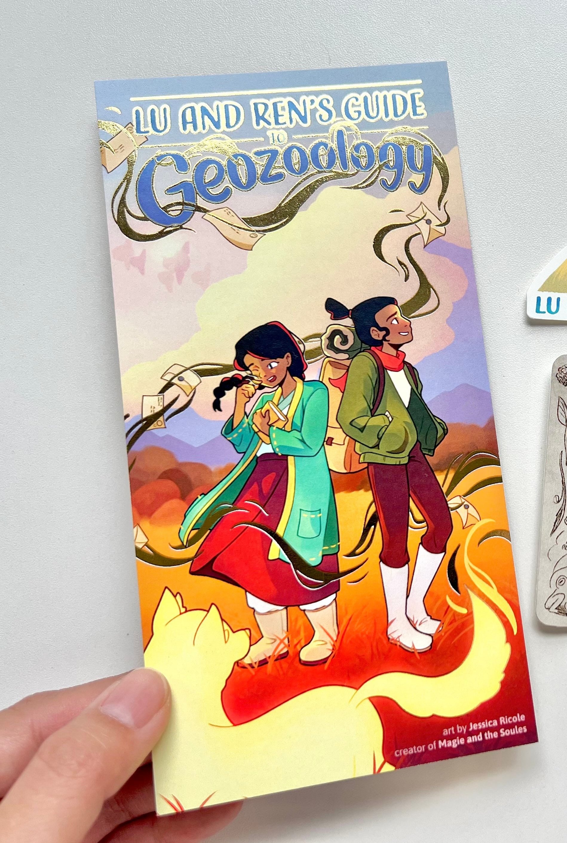 #18 – Lu and Ren's Guide to Geozoology Printed Bookmark with Gold Foil.jpg