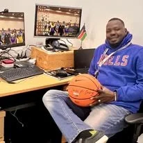 Coach Akol.jpg