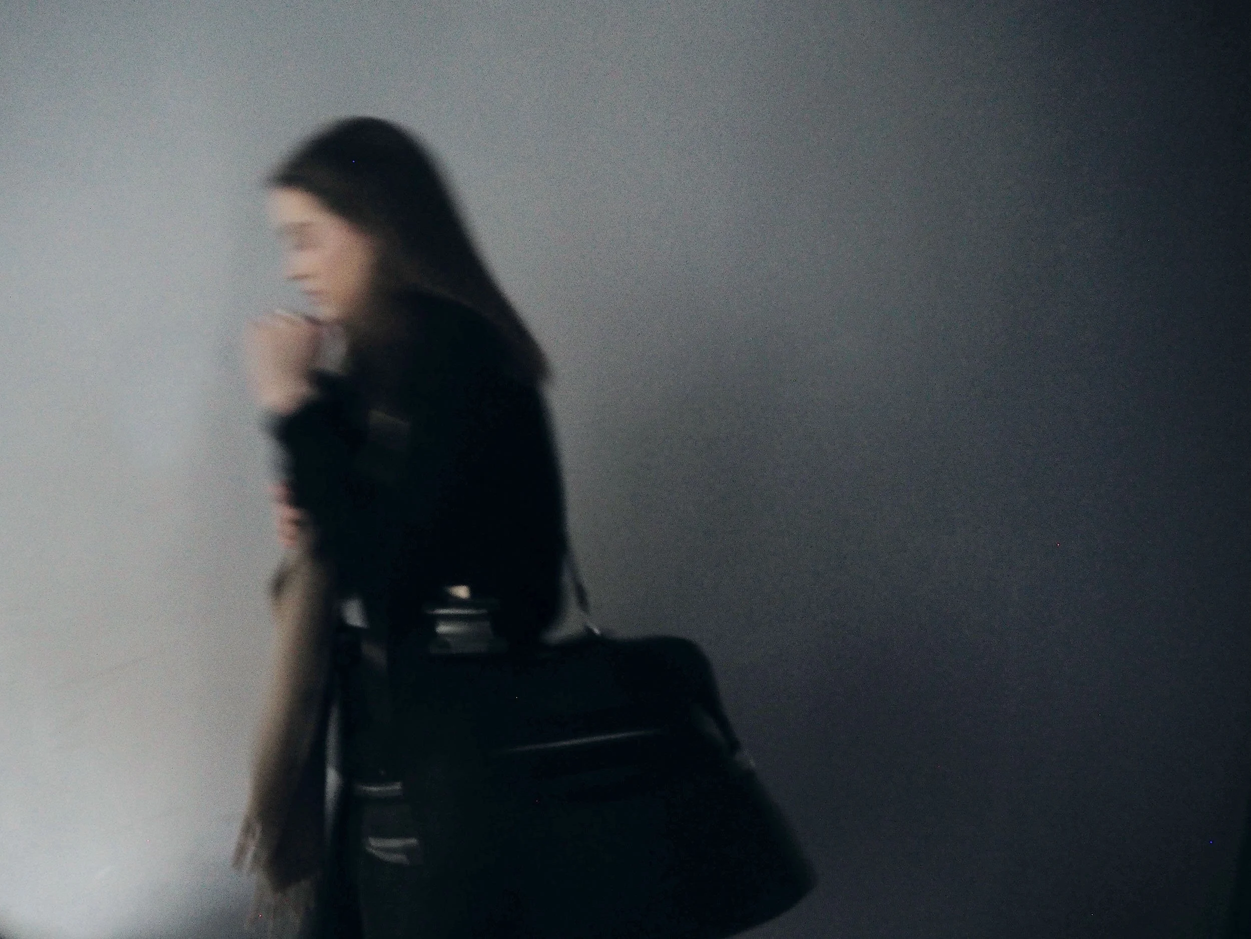 blurred-girl-carrying-bag.jpg