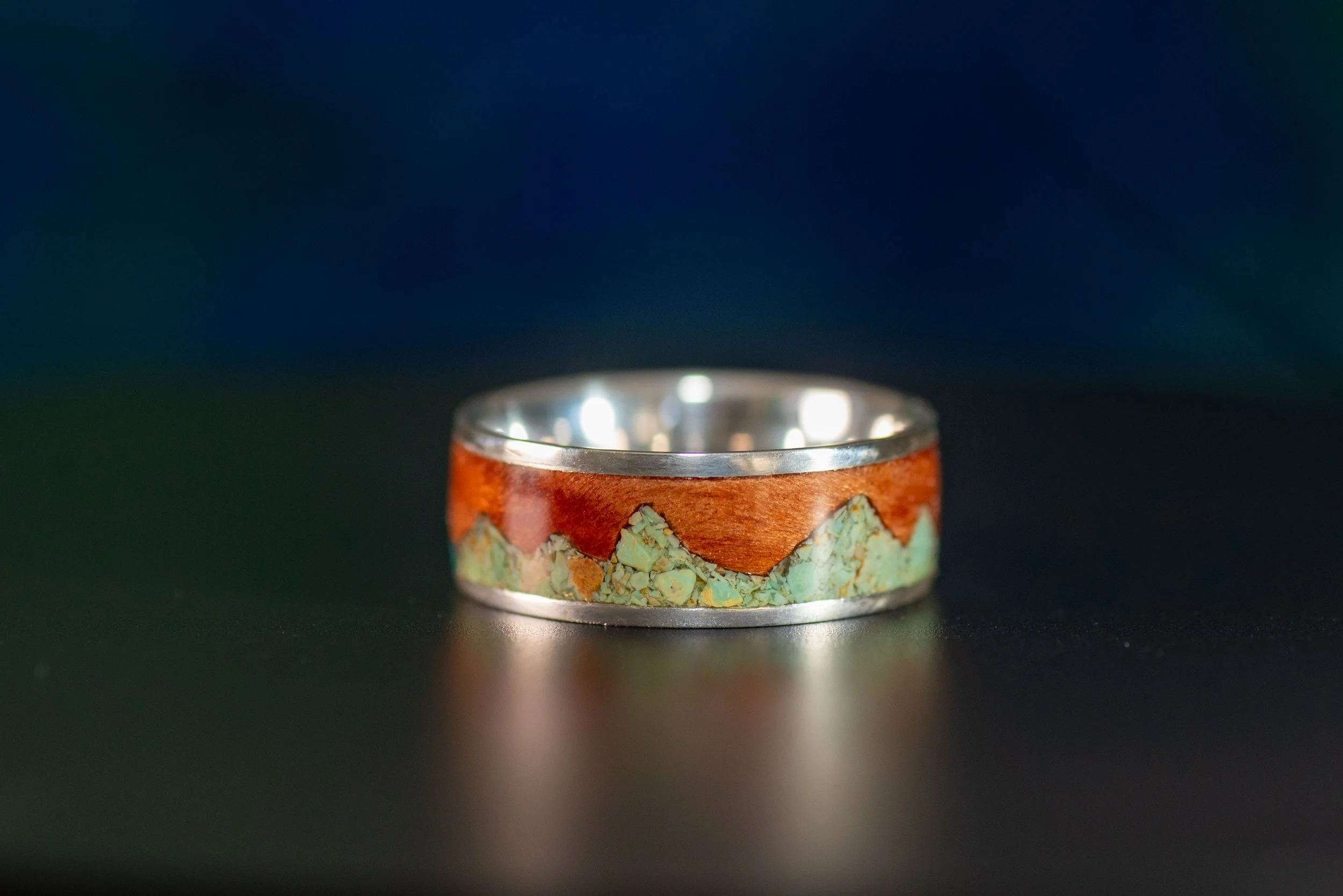 Sterling silver mountain ring with natural redwood and green Sonoran turquoise inlay.