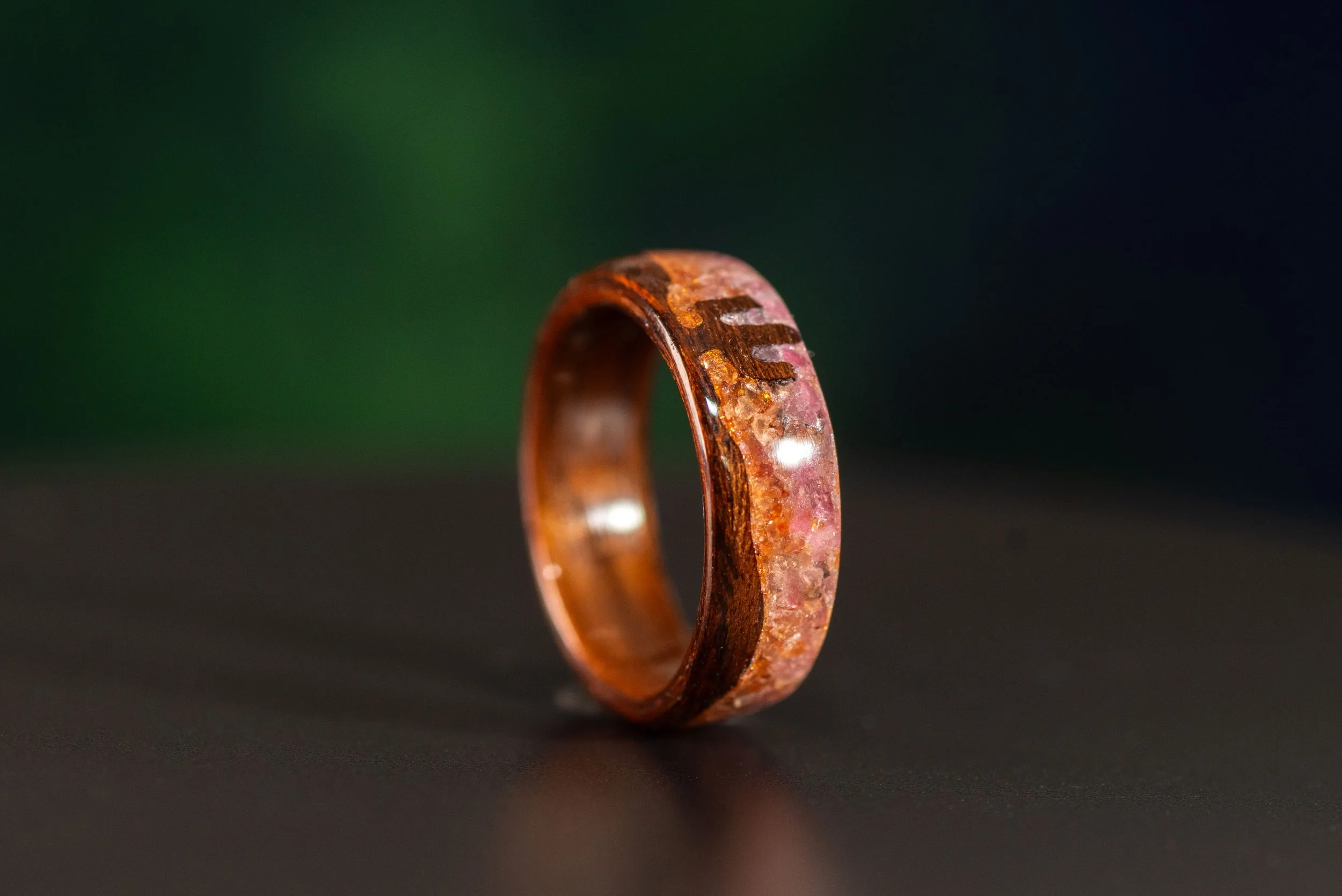 Men’s desert wedding band with smoked rosewood, saguaro cactus, pink tourmaline and carnelian inlay.