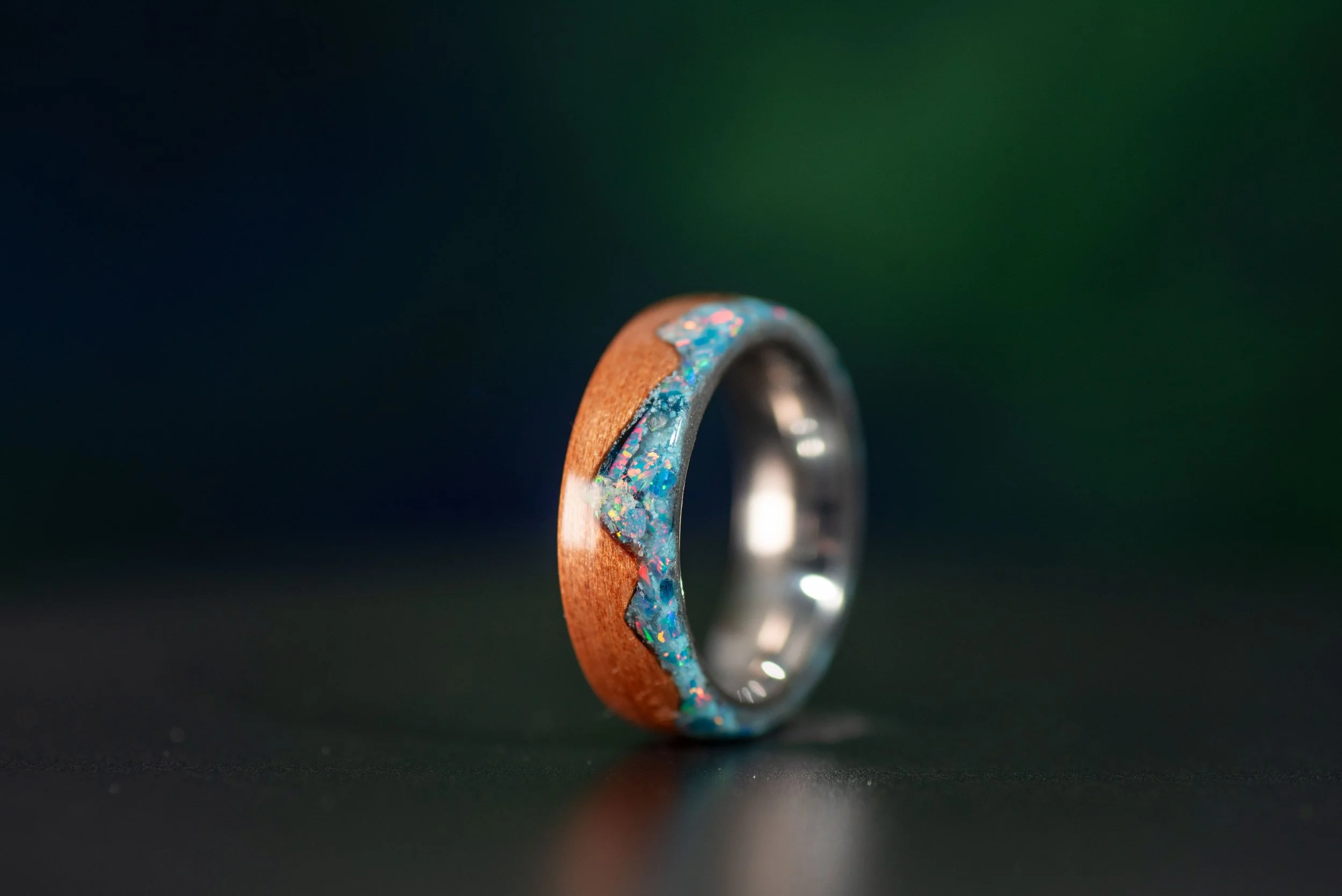 Mountain design wood ring with blue opal and white opal peaks