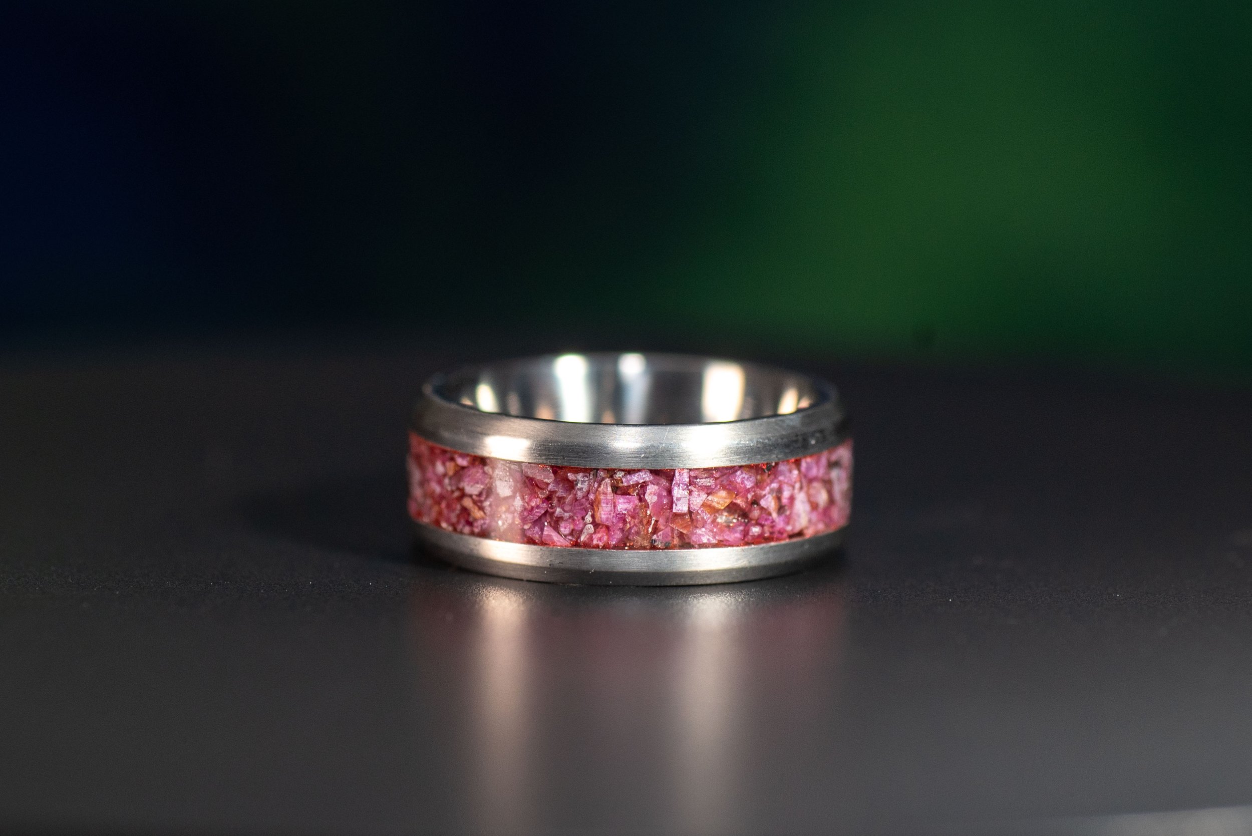garnet birthstone ring for the month of january. handcrafted unique titanium ring