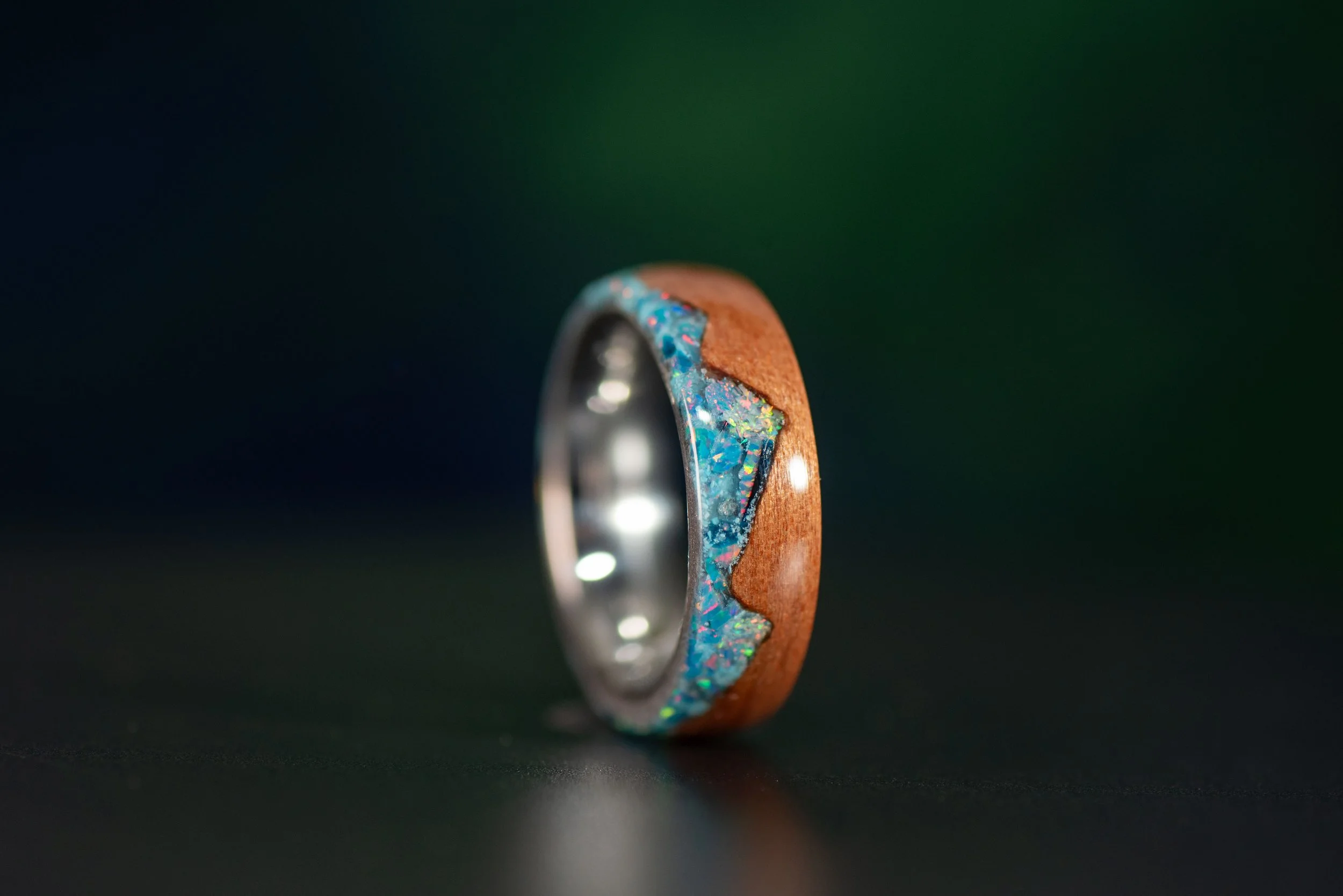 Handcrafted Tineo wood ring with turquoise mountain inlay
