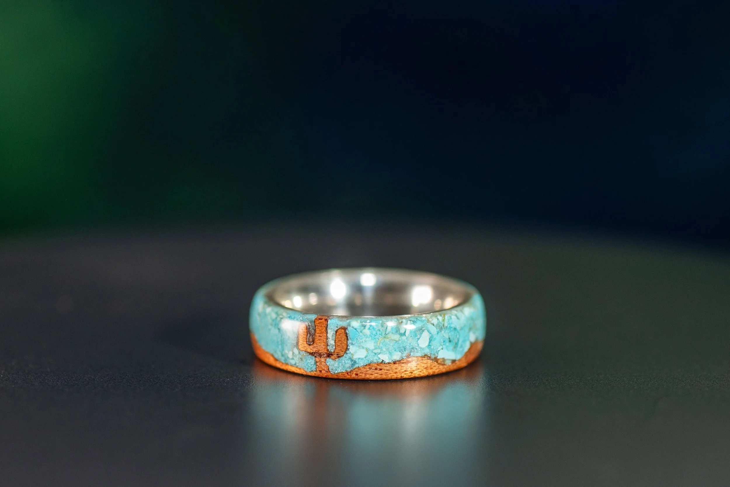 Men’s desert wedding band with cedar wood, saguaro cactus and Sleeping Beauty turquoise inlay.