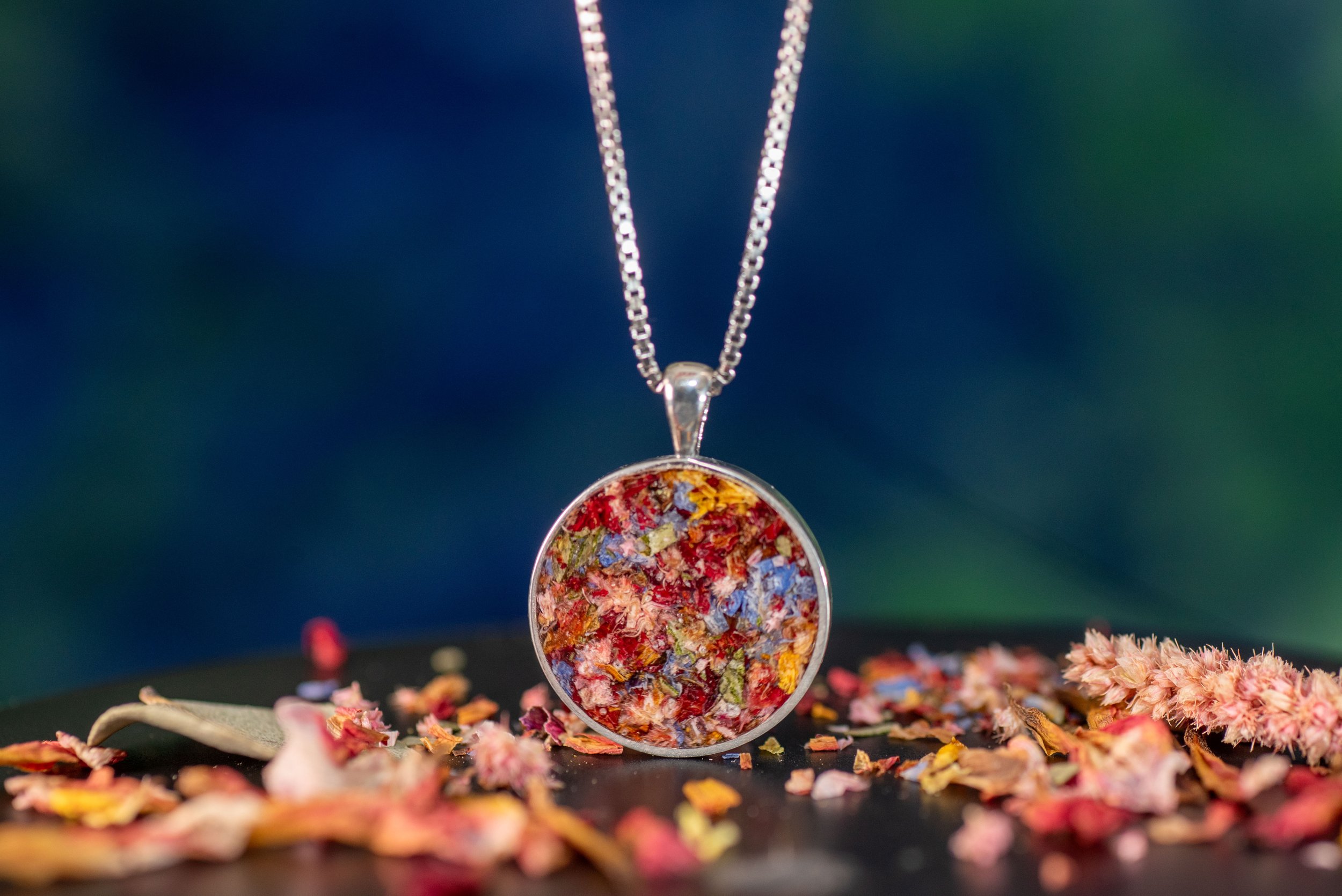 Personalized keepsake flower jewelry created from wedding, memorial, and funeral flowers