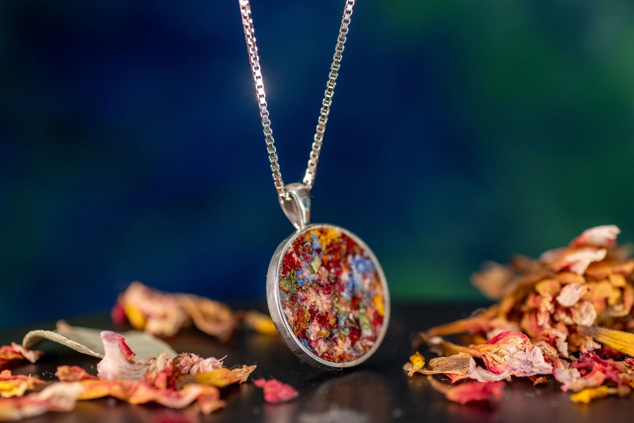 Custom flower preservation pendant with real flowers set inside sterling silver