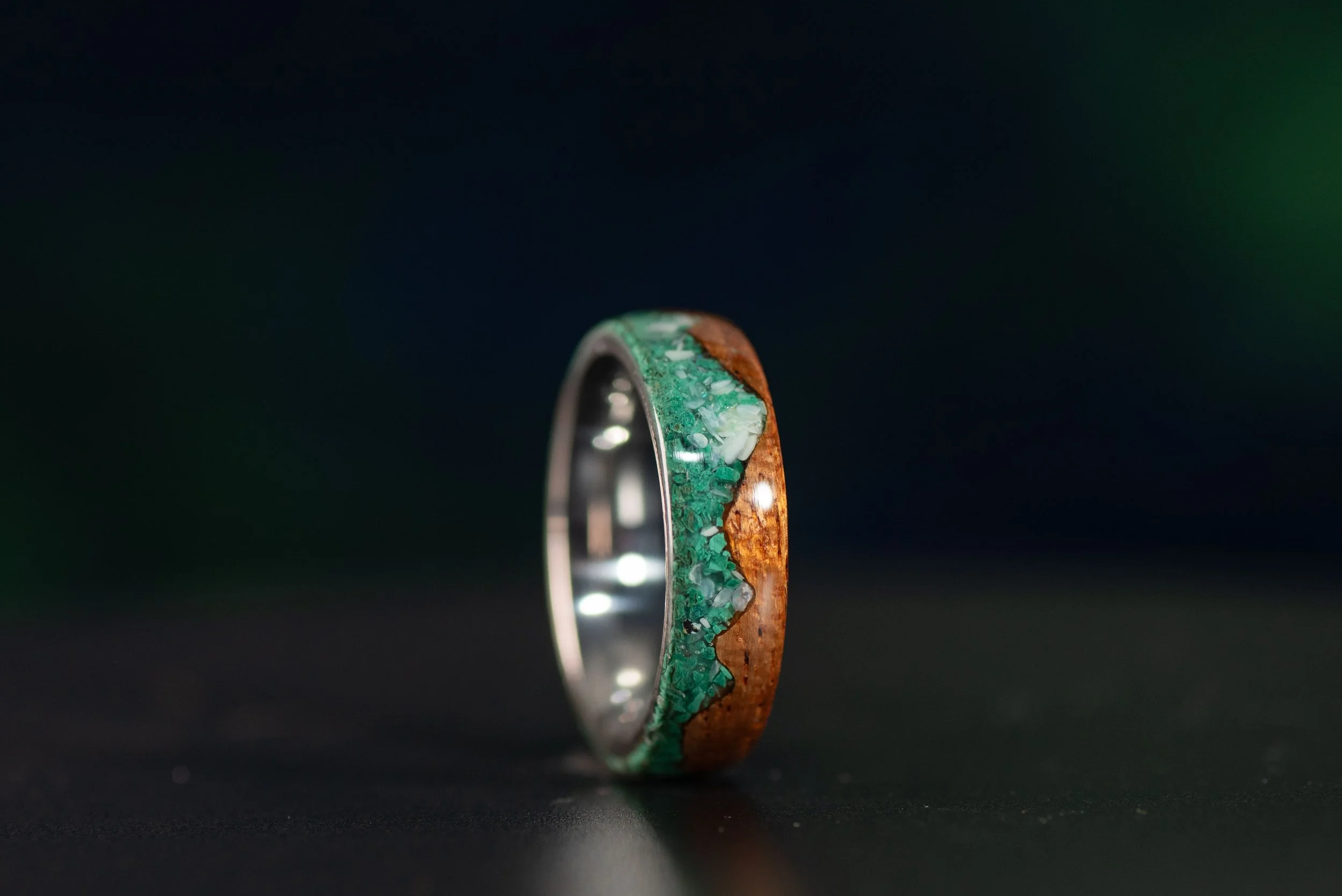 Custom mahogany ring with mountain design in malachite and mother of pearl