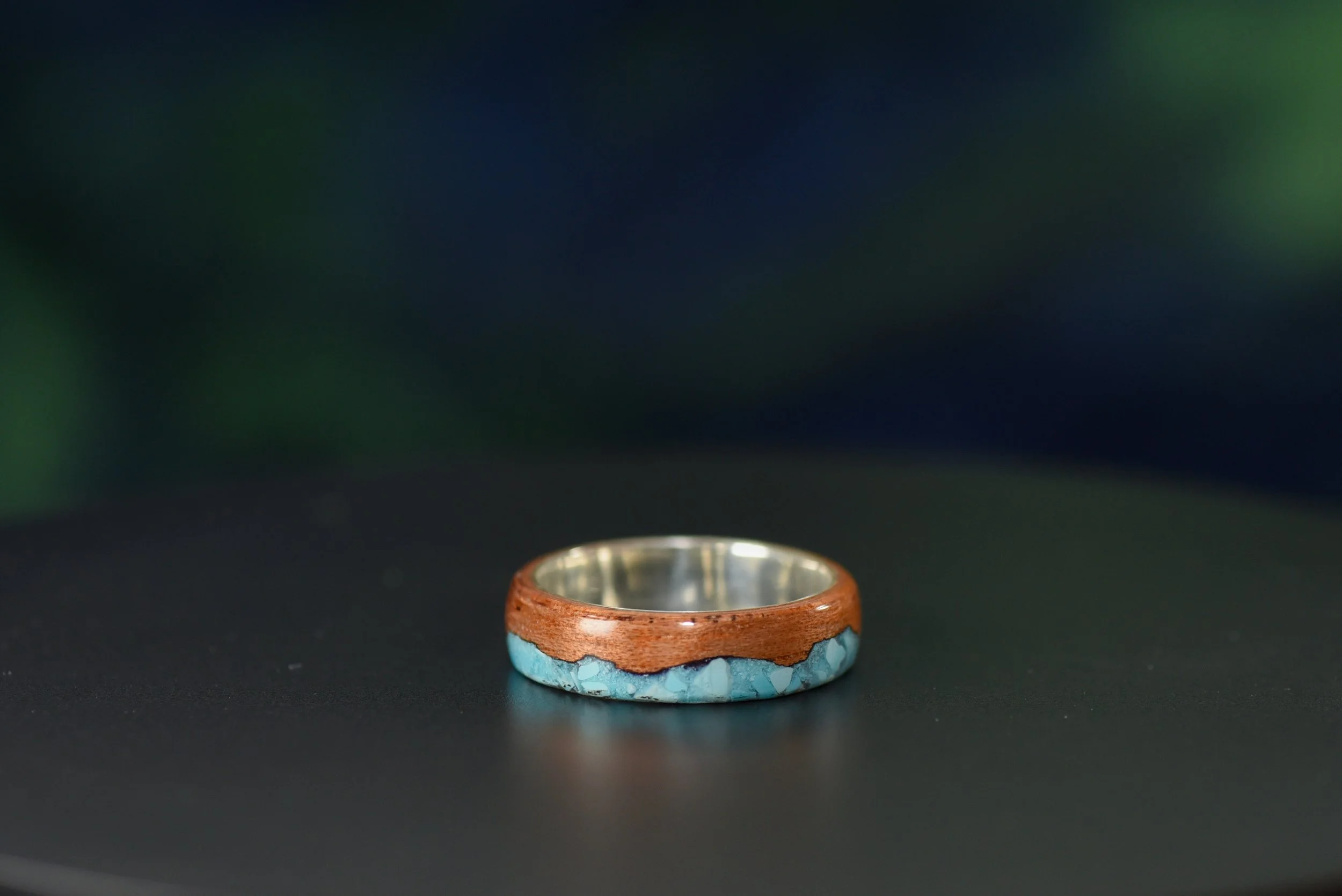 Southwest inspired wood ring featuring cedar, Sleeping Beauty turquoise and green Sonoran turquoise inlay.