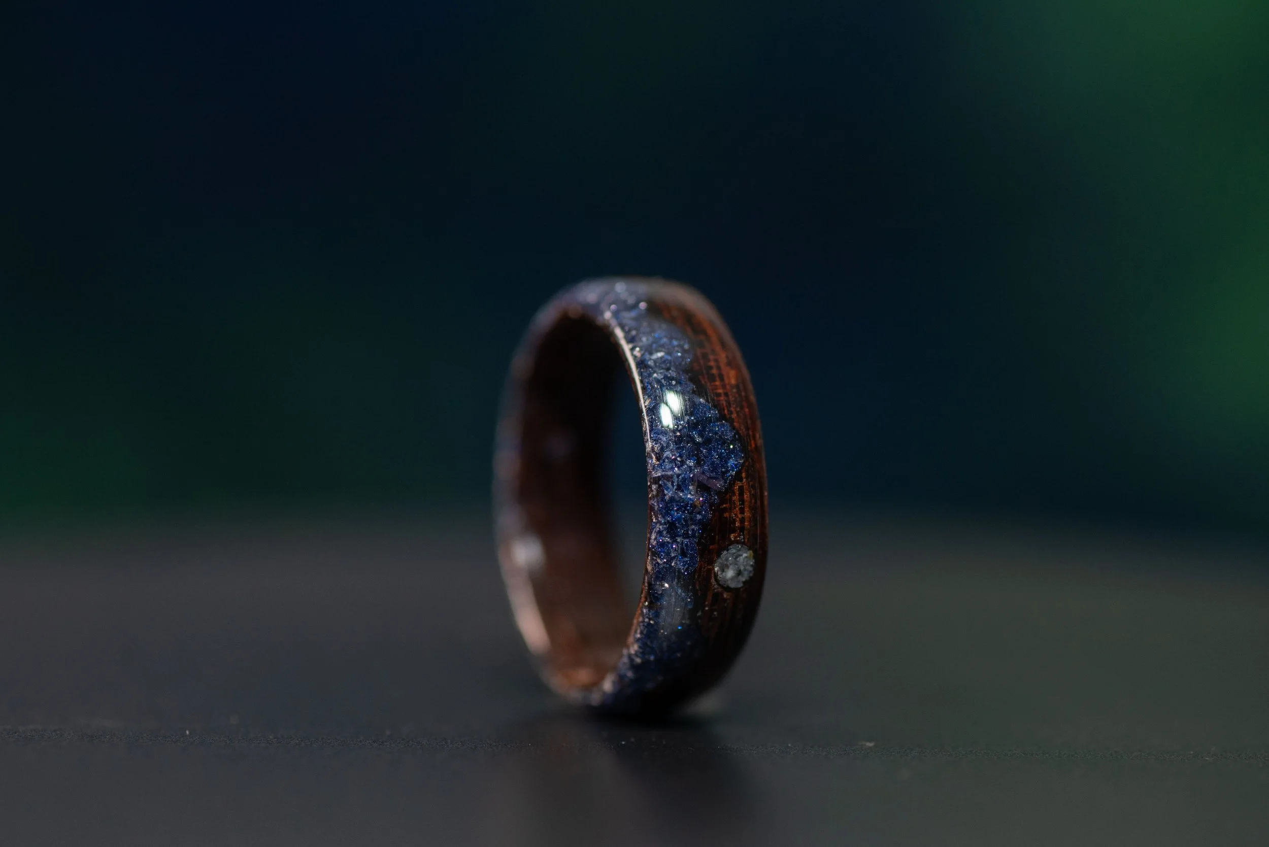 Unique wenge wood ring with sparkling blue sunstone inlay