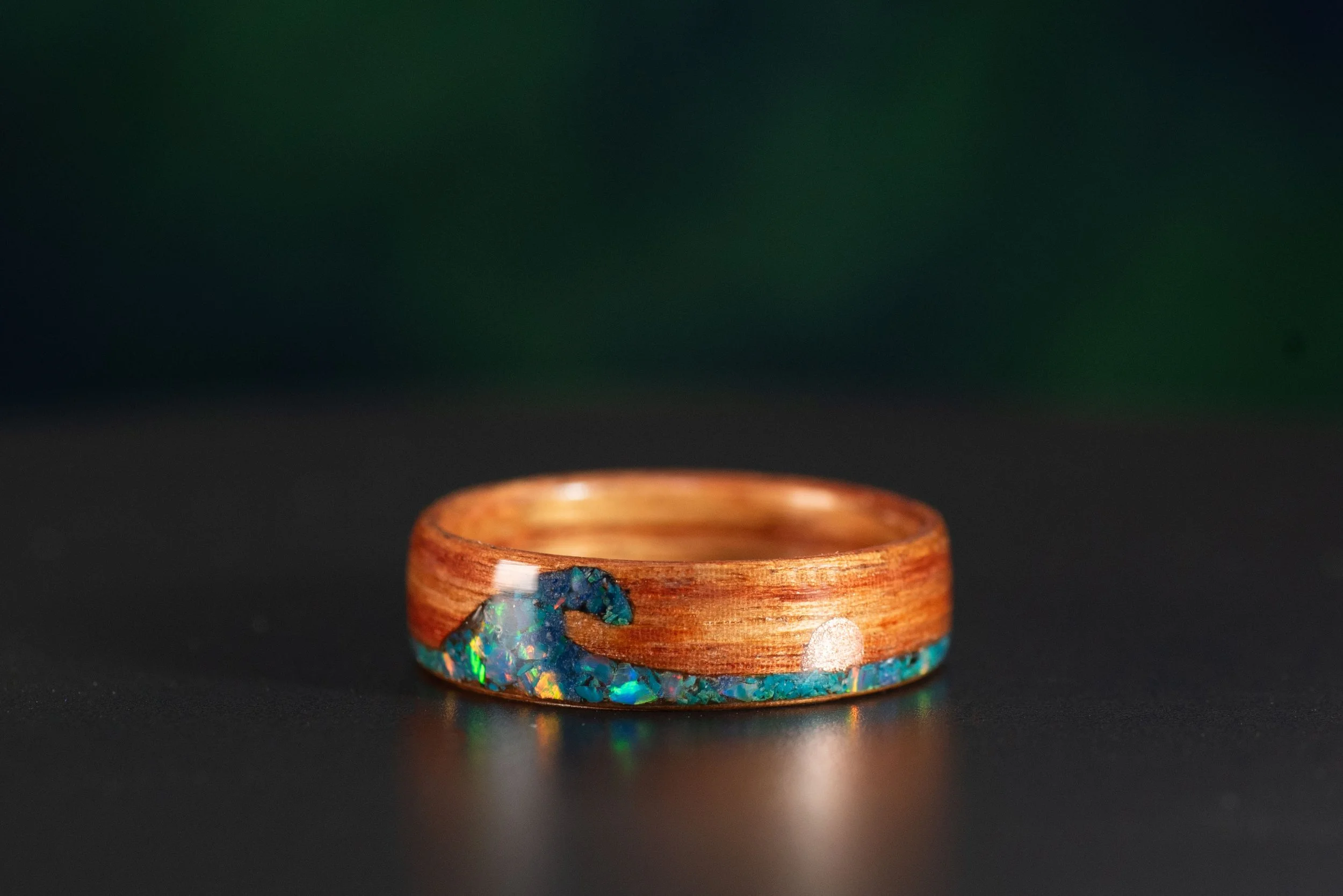 Custom tineo wood ring with copper sun and colorful wave inlay