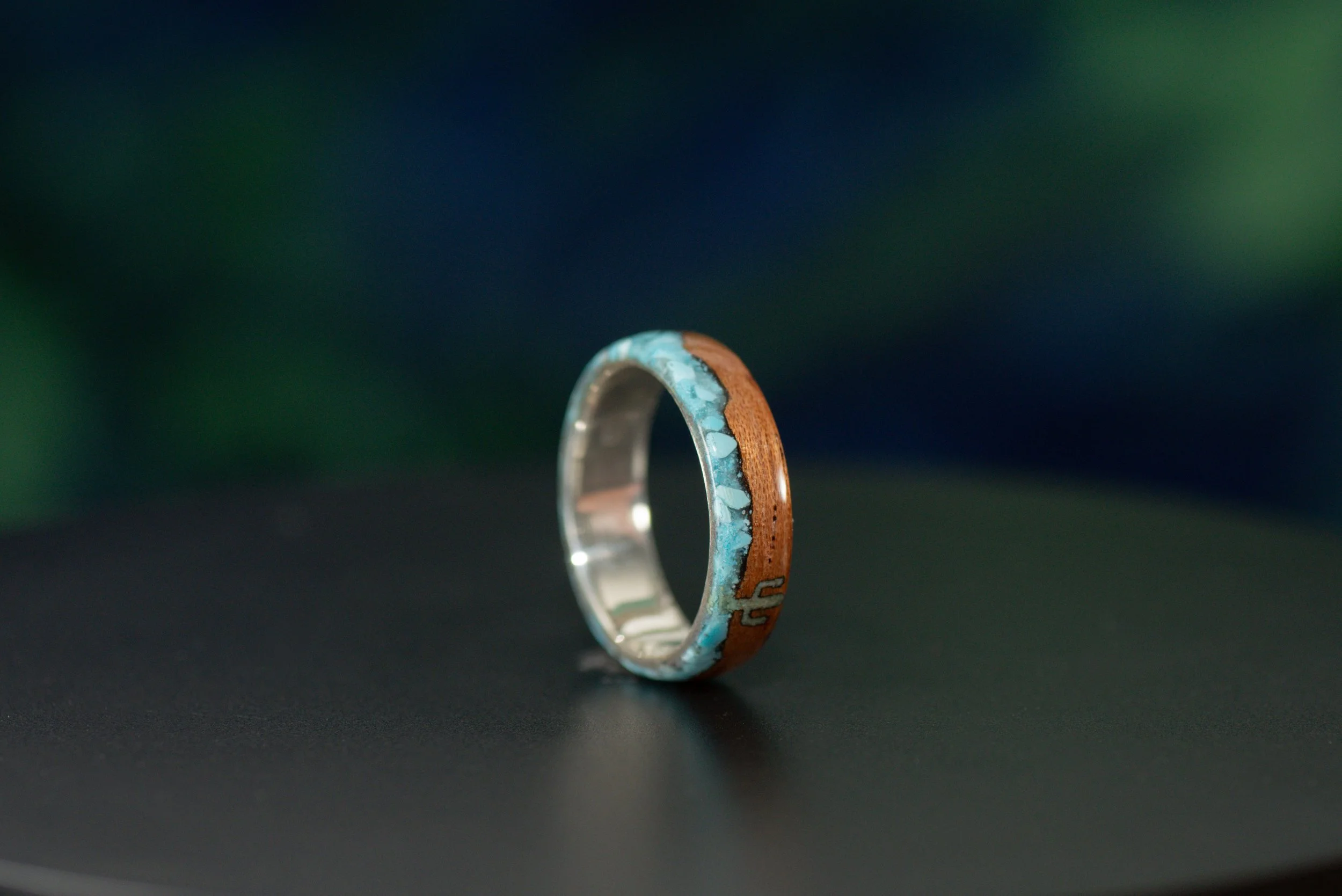 Handmade cedar and turquoise ring with sterling silver core, cactus landscape and Southwest mountain design.