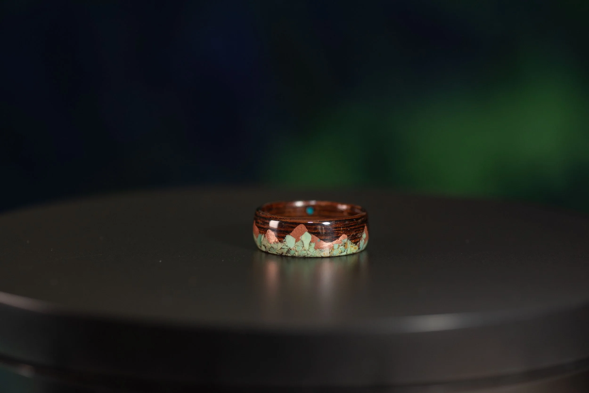 Outdoor inspired wood ring with mountain design and copper