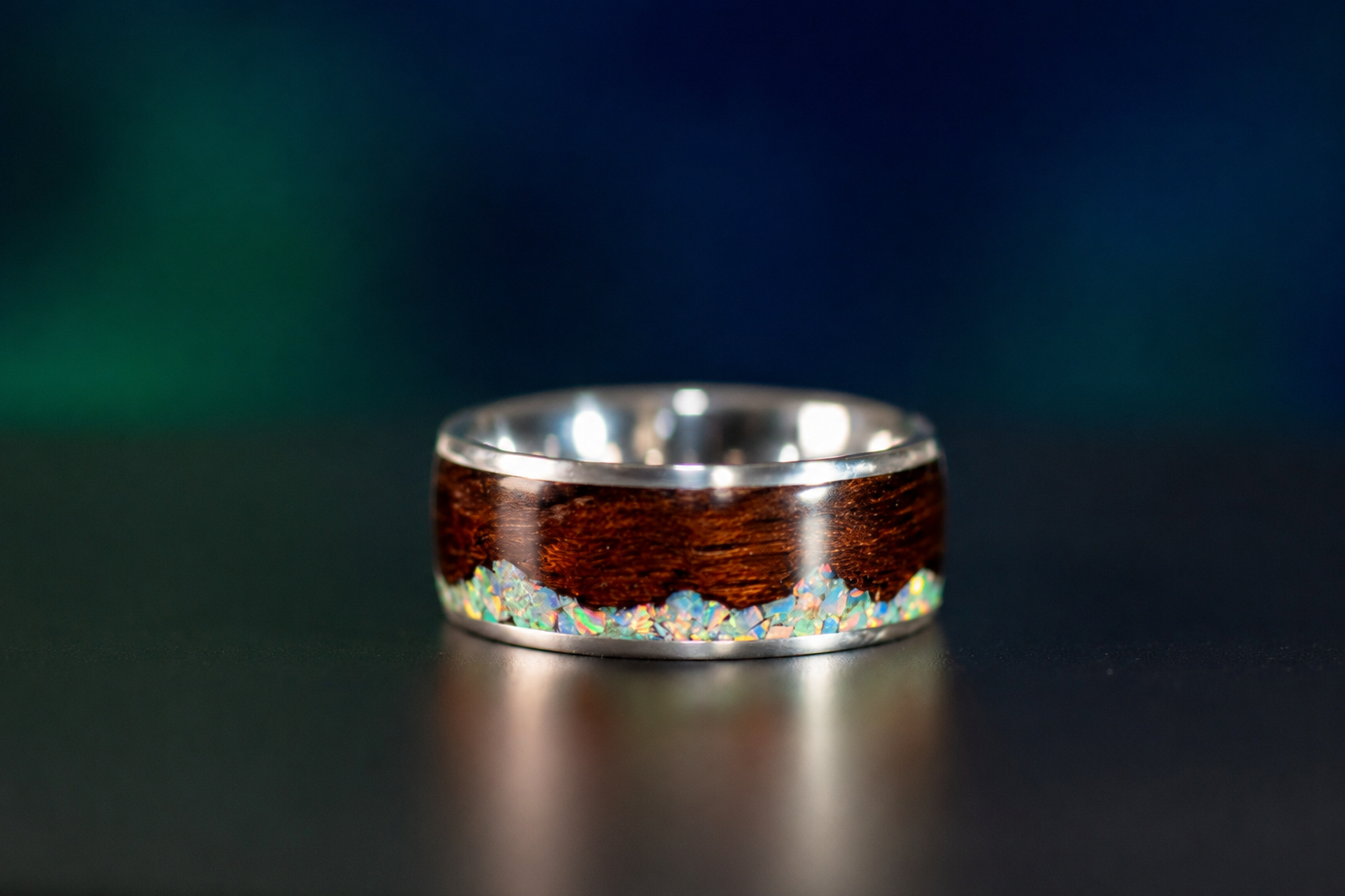 Handcrafted sterling silver men’s mountain ring with white opal peaks and smoked rosewood inlay