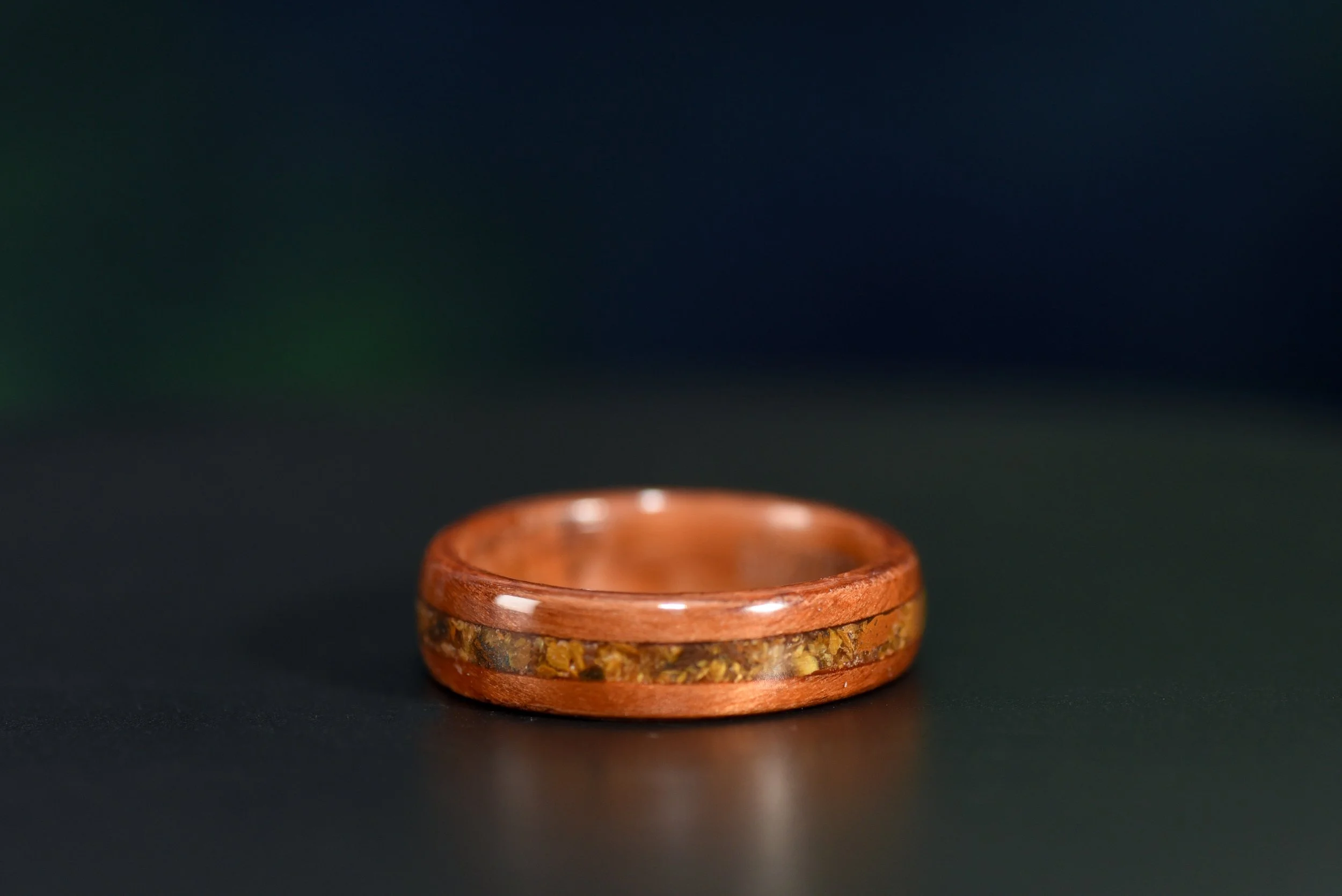 Handmade redwood ring with golden brown tiger’s eye inlay, nature inspired wood and stone ring.