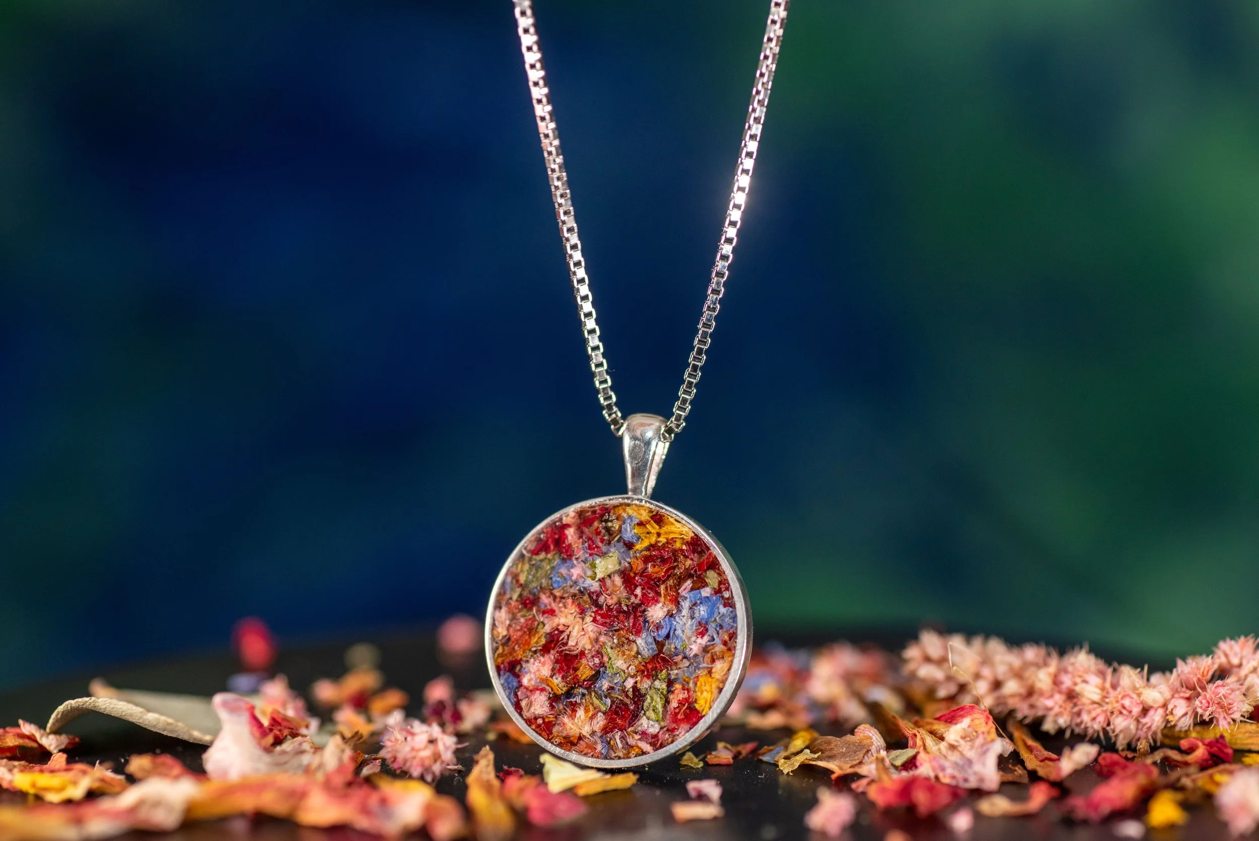 Handmade sterling silver remembrance necklace preserving anniversary flowers