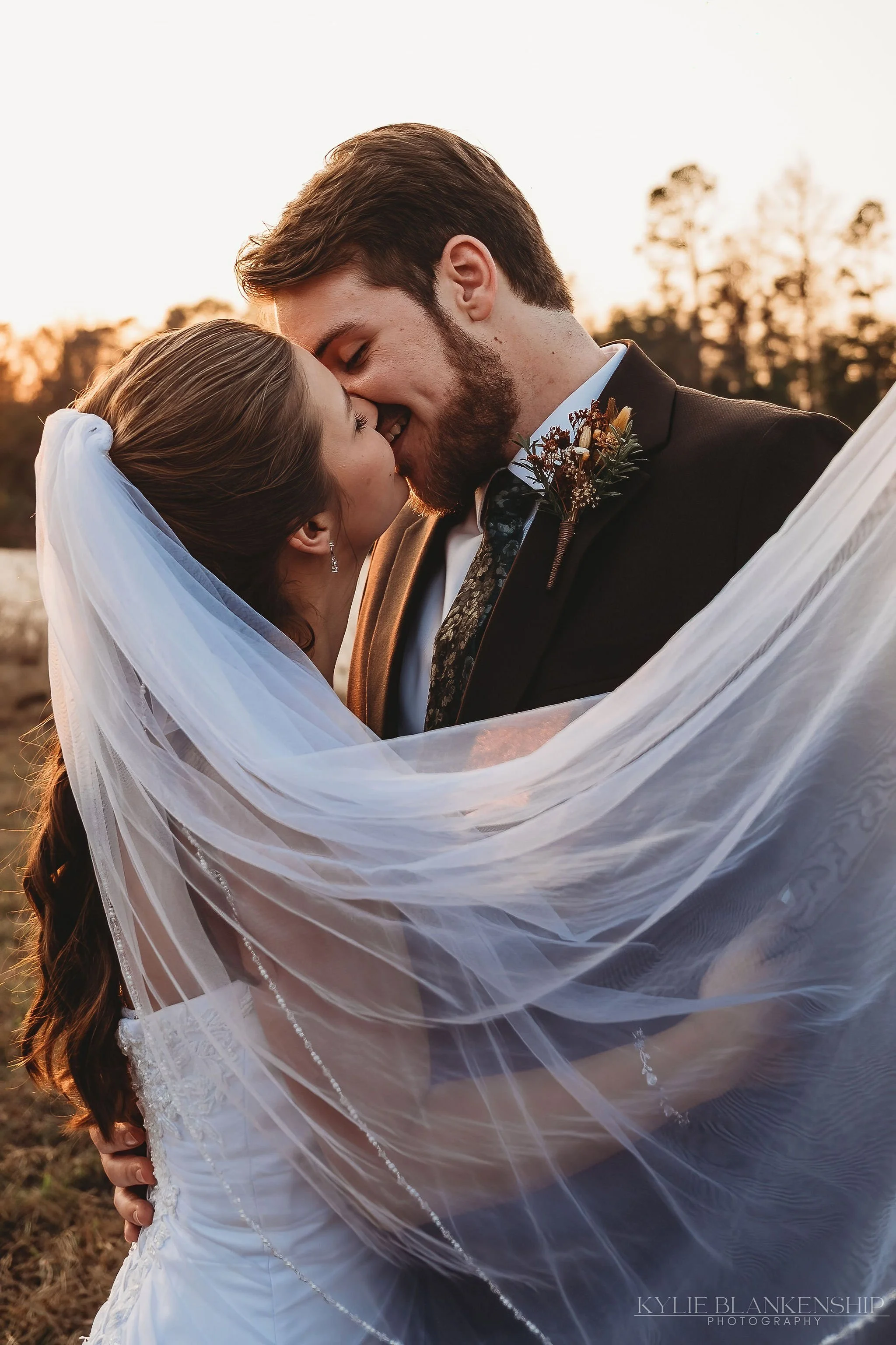 grassy edge veiled kiss.jpg