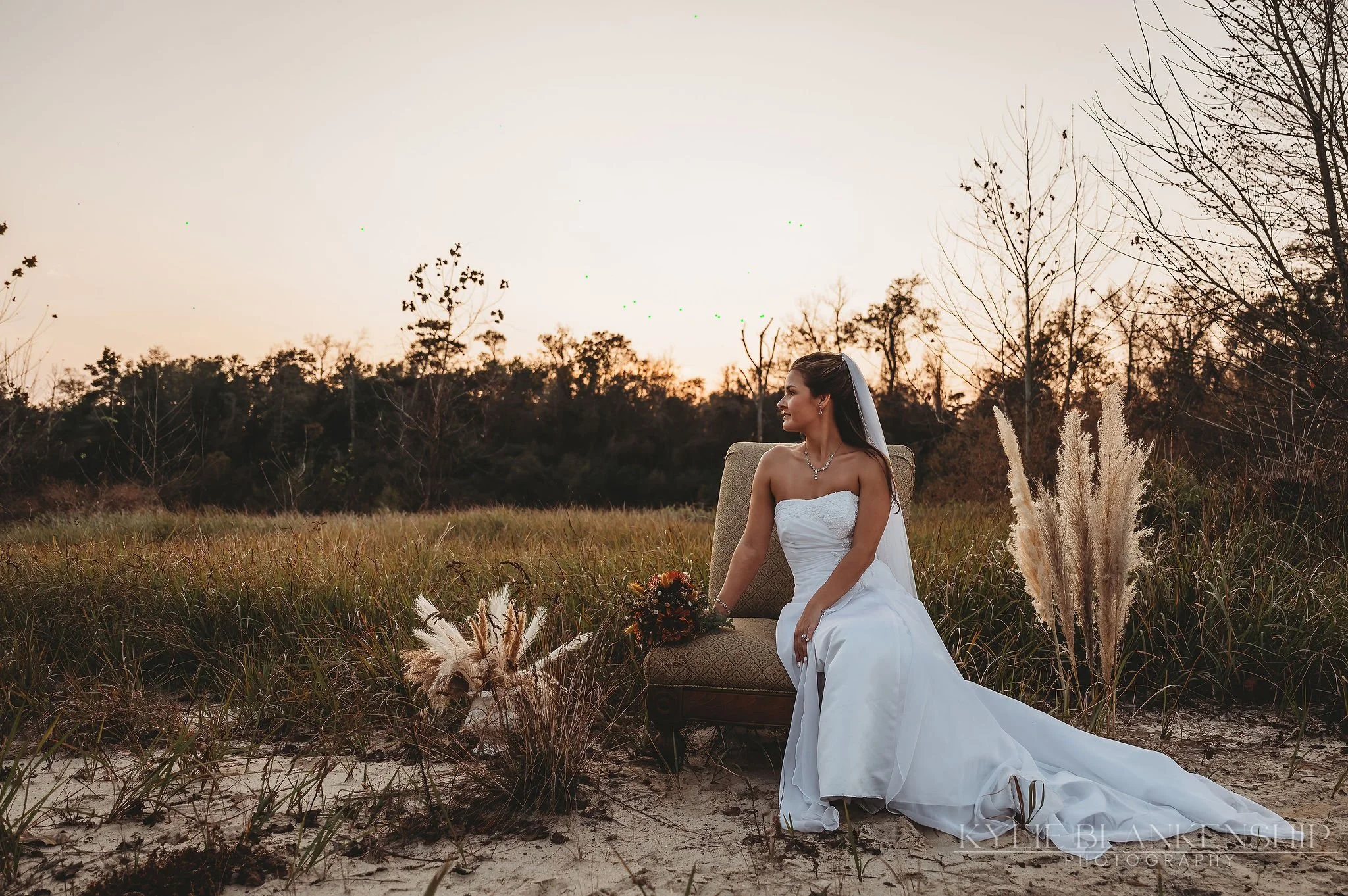 Golden hour bride on field edge.jpg