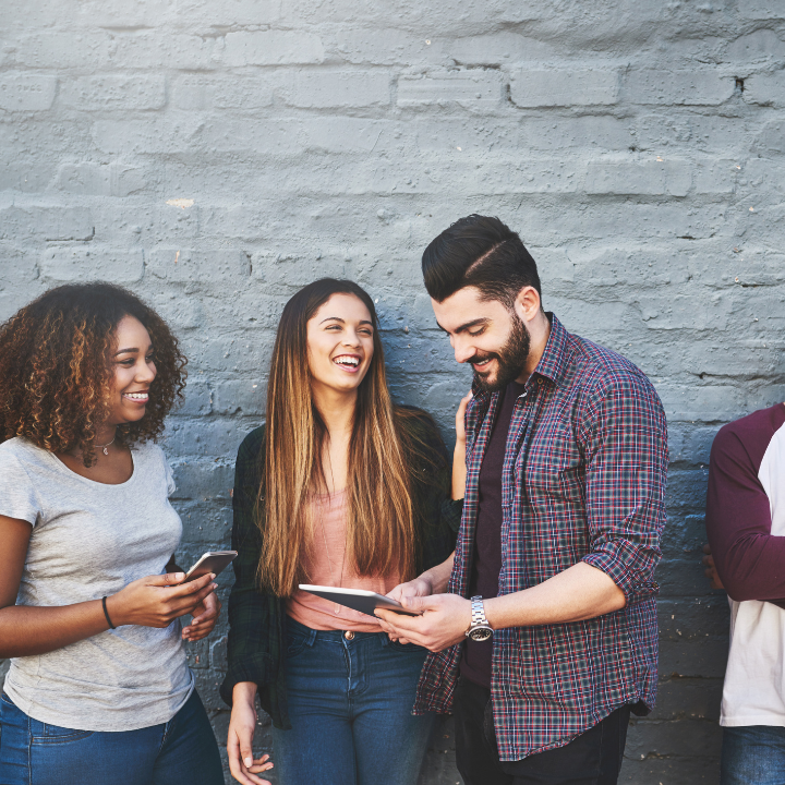 Group of people reading reviews for local businesses.