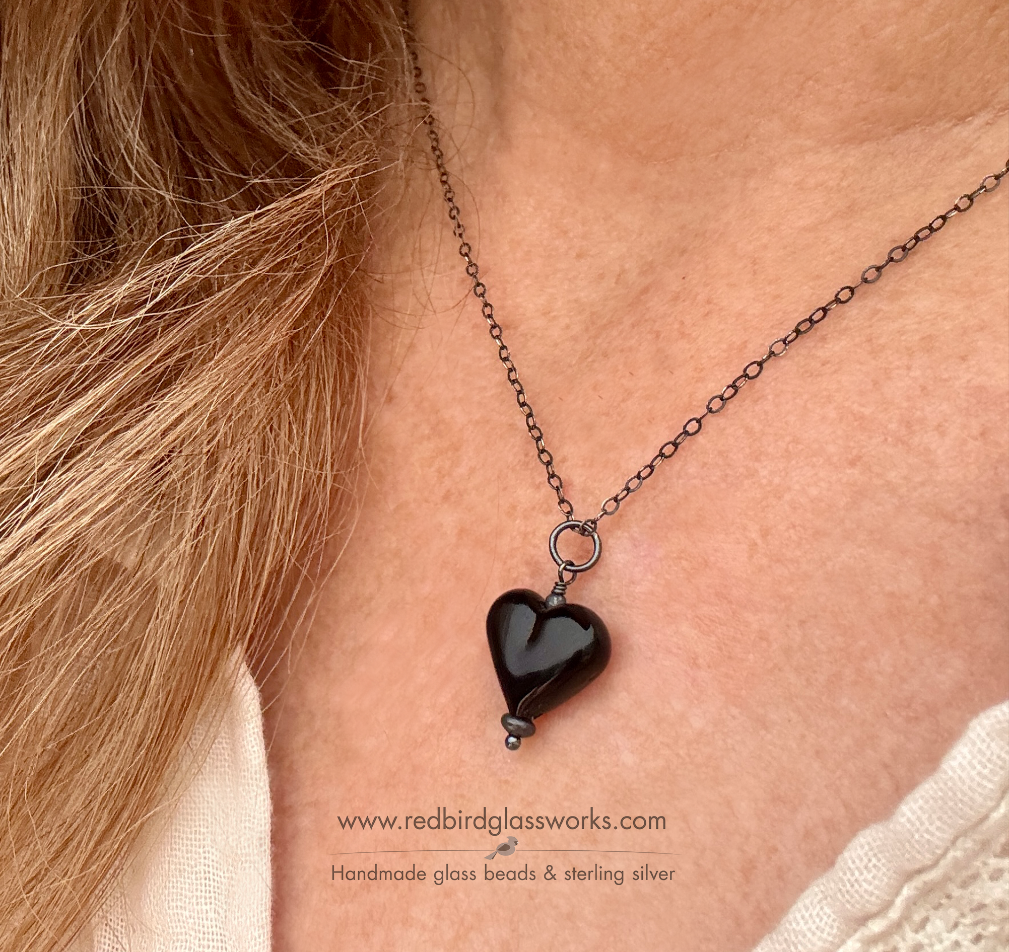 SmBlkheartnecklogo.png