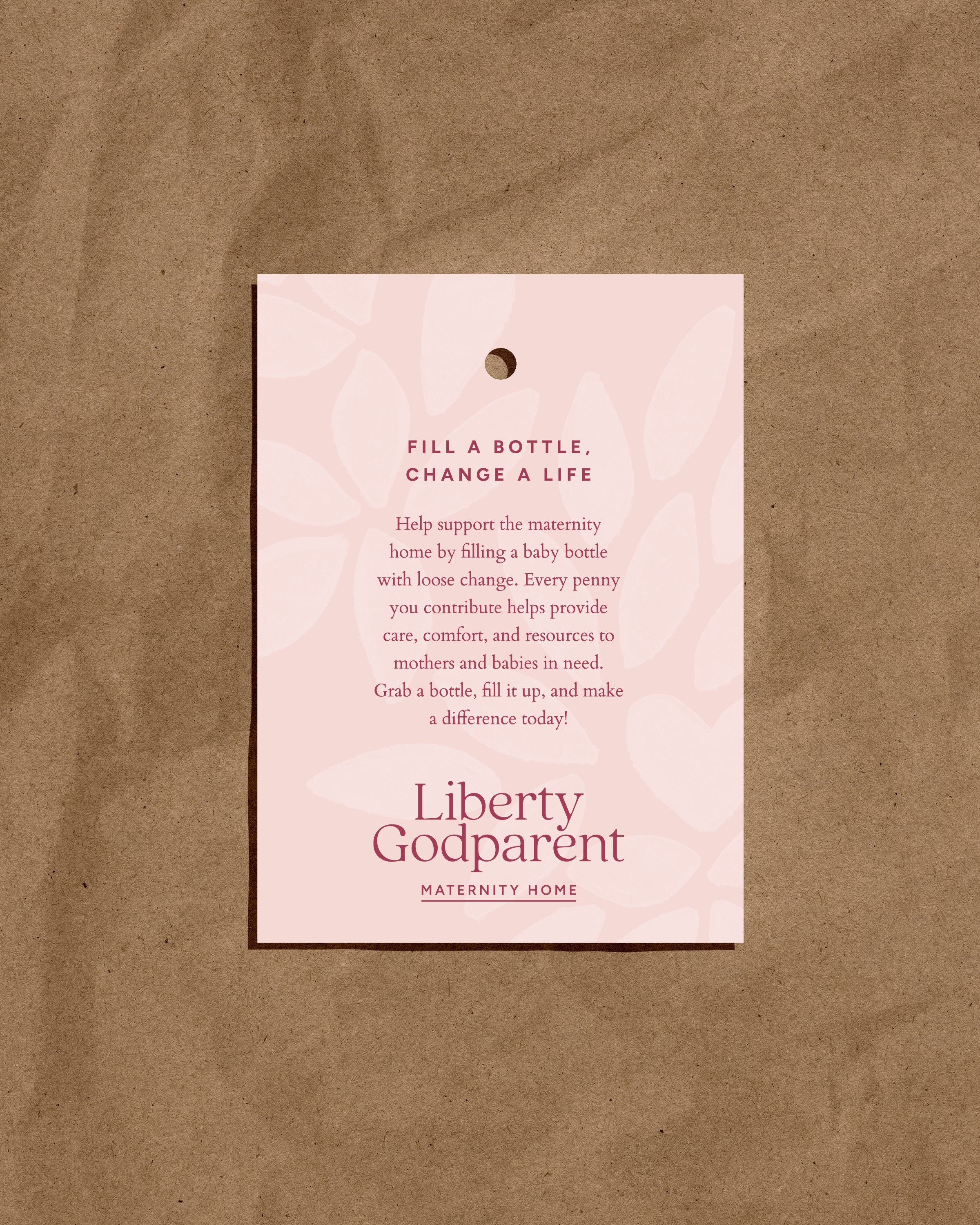 A pink and white informational flyer titled 'Fill a Bottle, Change a Life' supporting maternity and baby bottle filling campaign, with text about contributing to mothers and babies in need, branded with 'Liberty Godparent Maternity Home' on brown paper background.