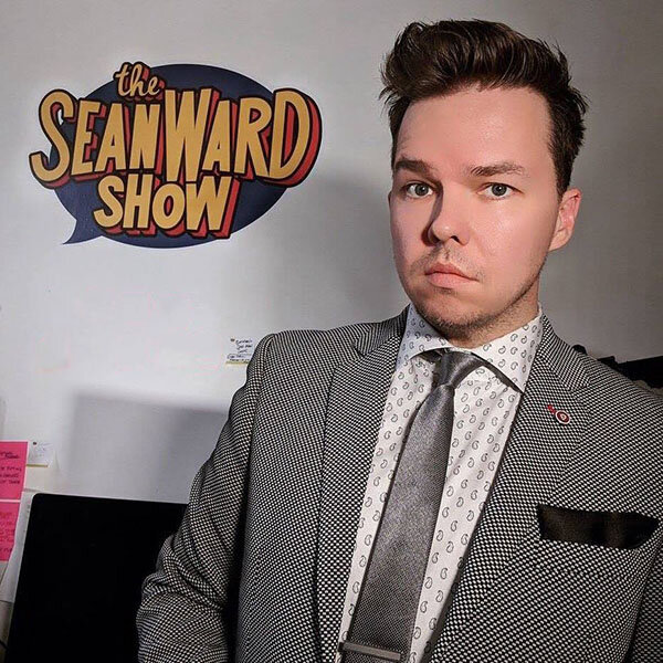 Sean Ward in a silver suit