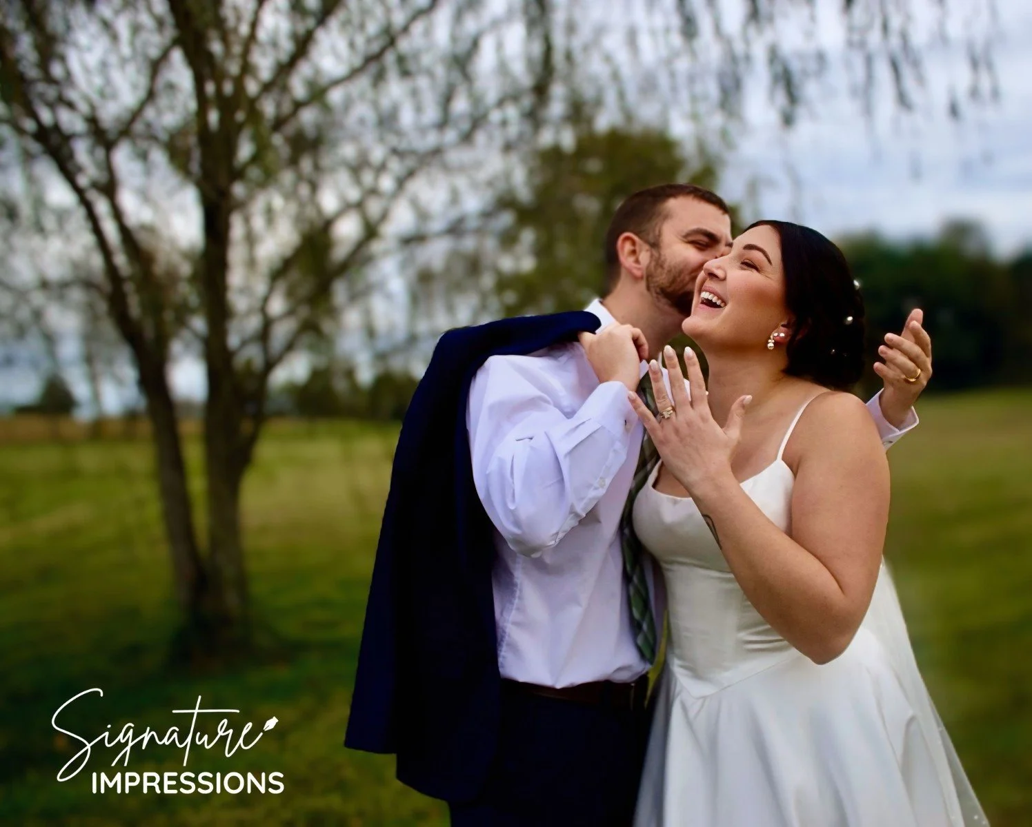 Sammi Groom Kiss 2.jpg